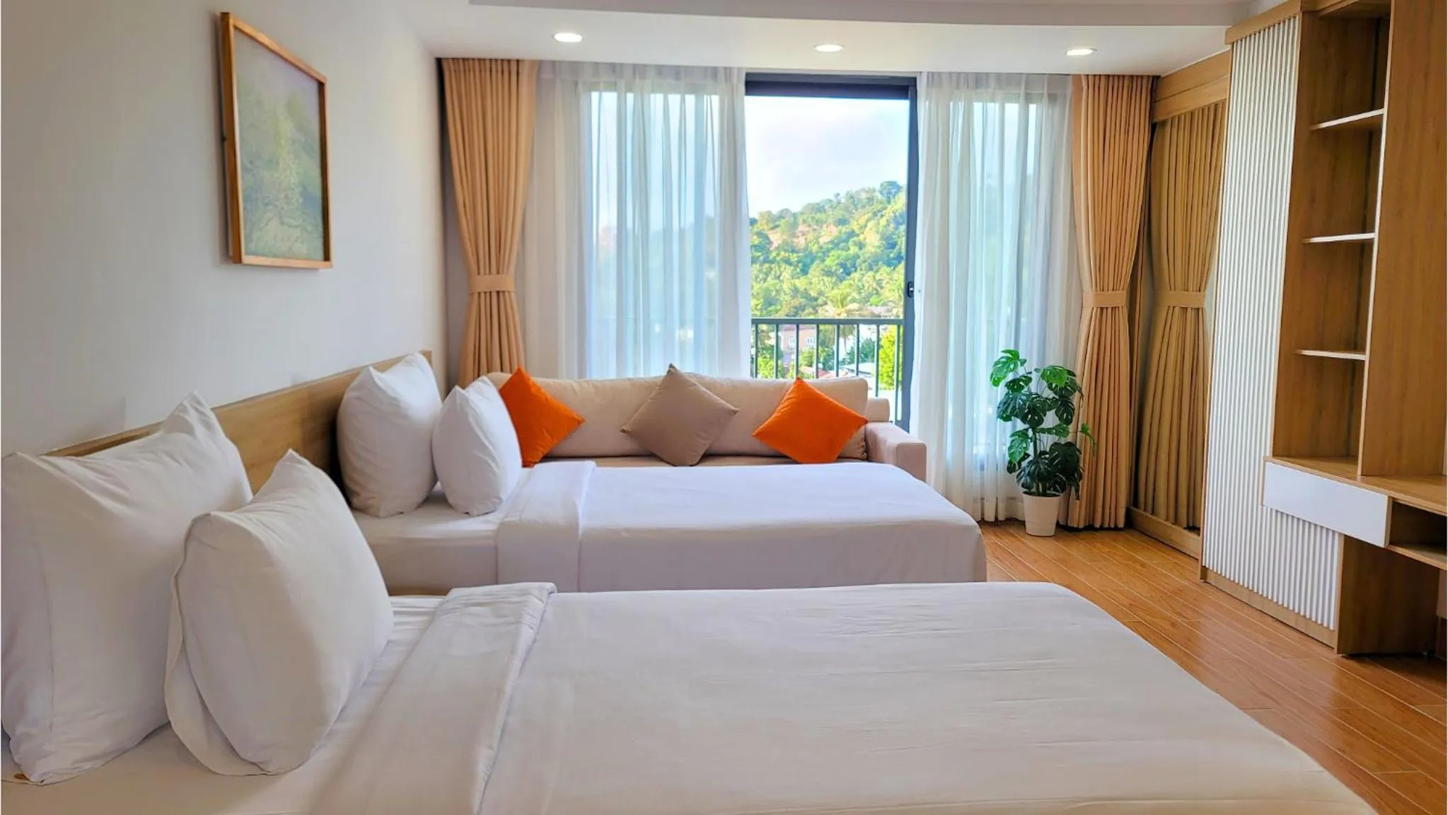 Seating area, Bed in Rosetta Hotel Phu Quoc