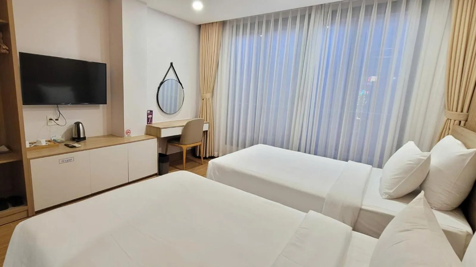 Photo of the whole room, Bed in Rosetta Hotel Phu Quoc