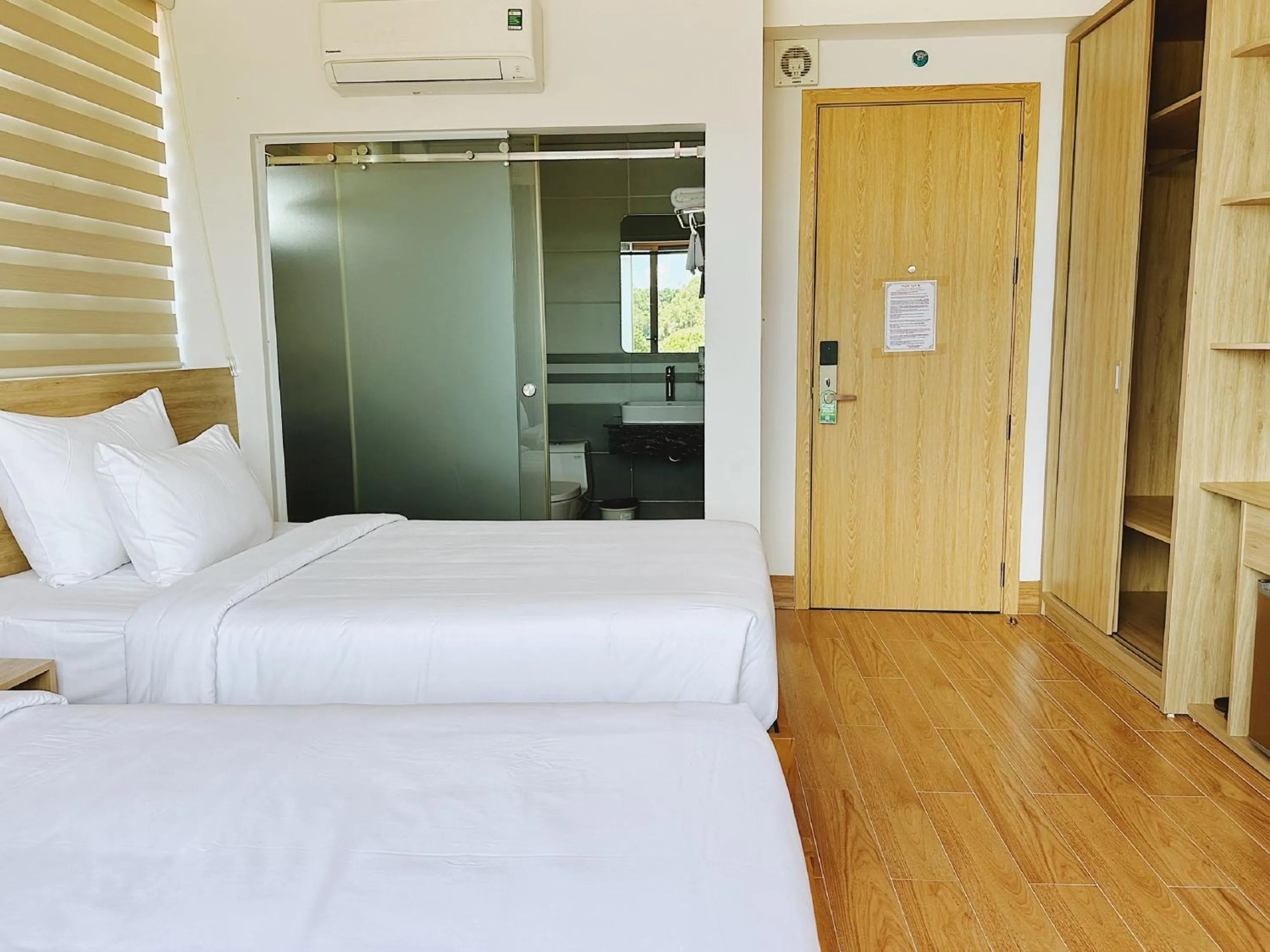 Photo of the whole room, Bed in Rosetta Hotel Phu Quoc