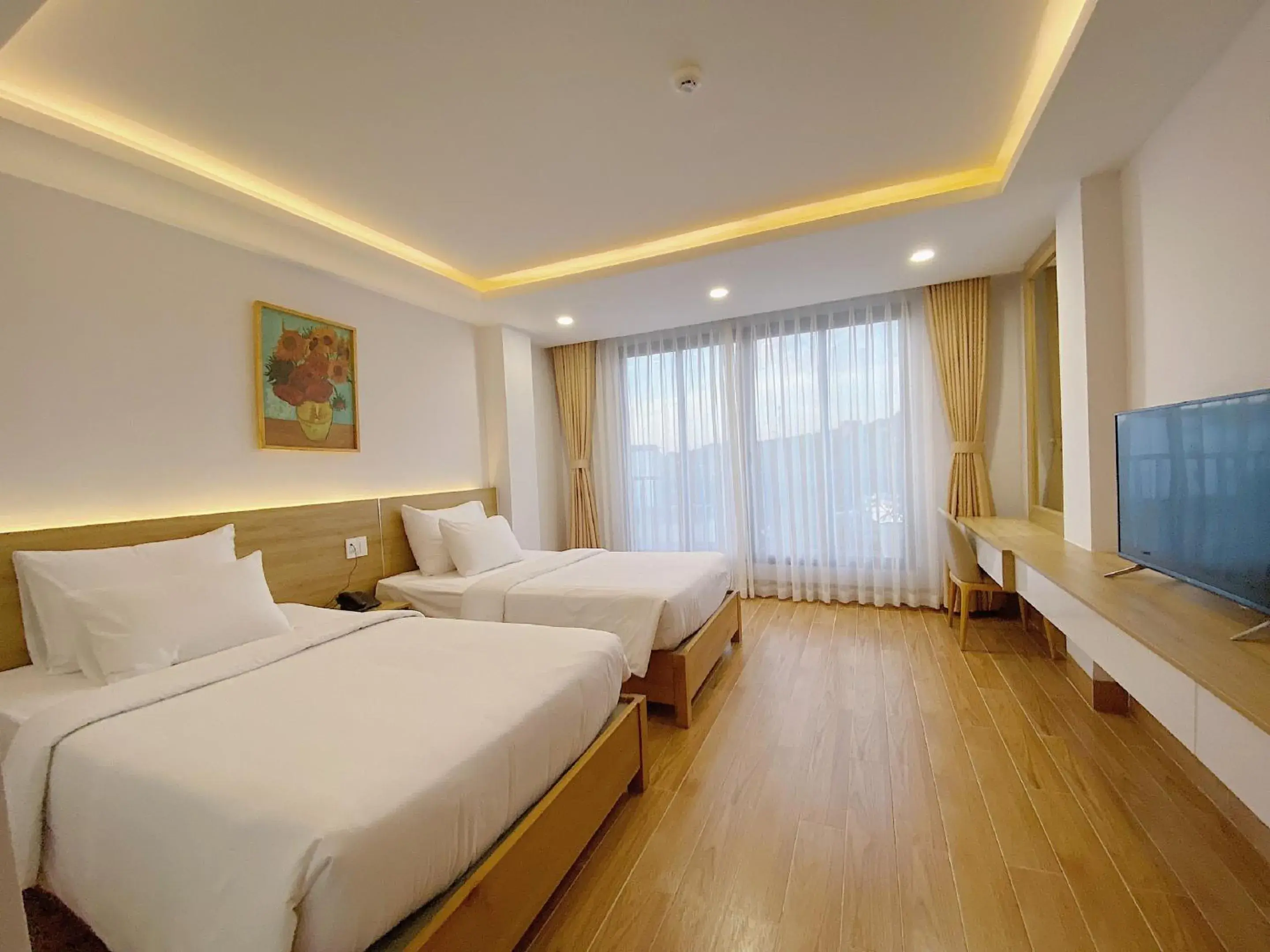 Triple Room with Balcony in Rosetta Hotel Phu Quoc Triple Room with Balcony in Rosetta Hotel Phu Quoc