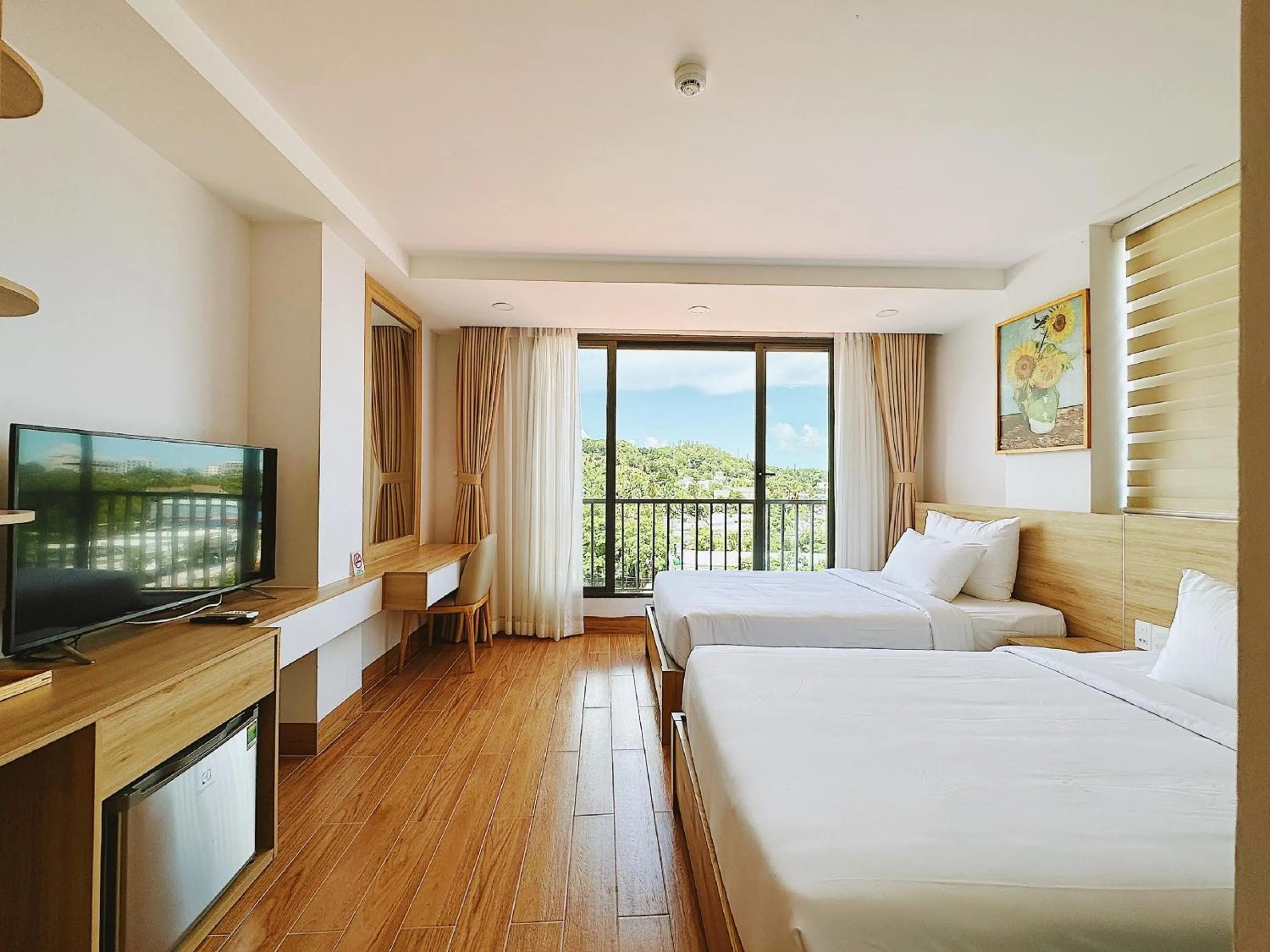 Photo of the whole room, Bed in Rosetta Hotel Phu Quoc