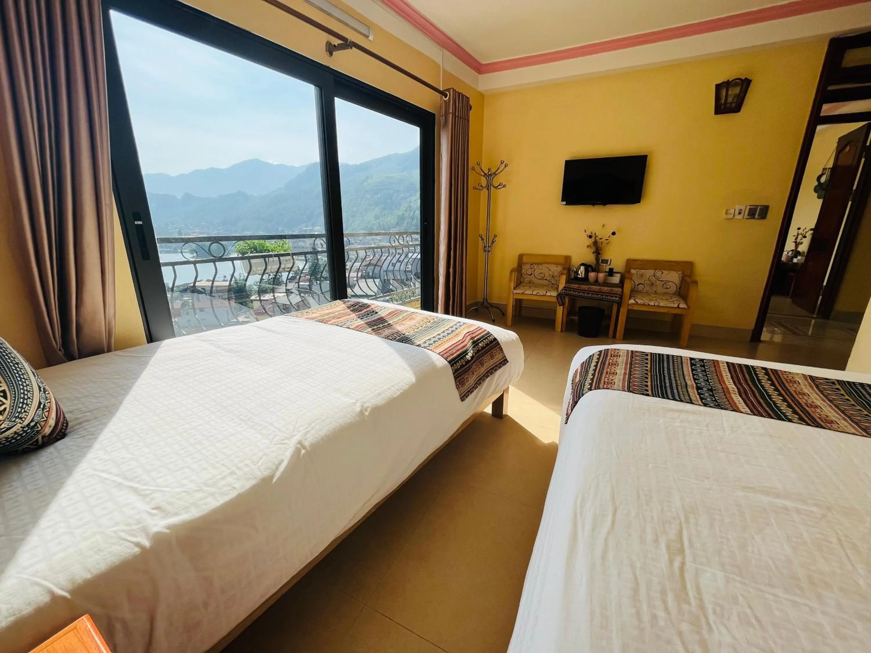 Bed in HAPPY FAMILY HOTEL