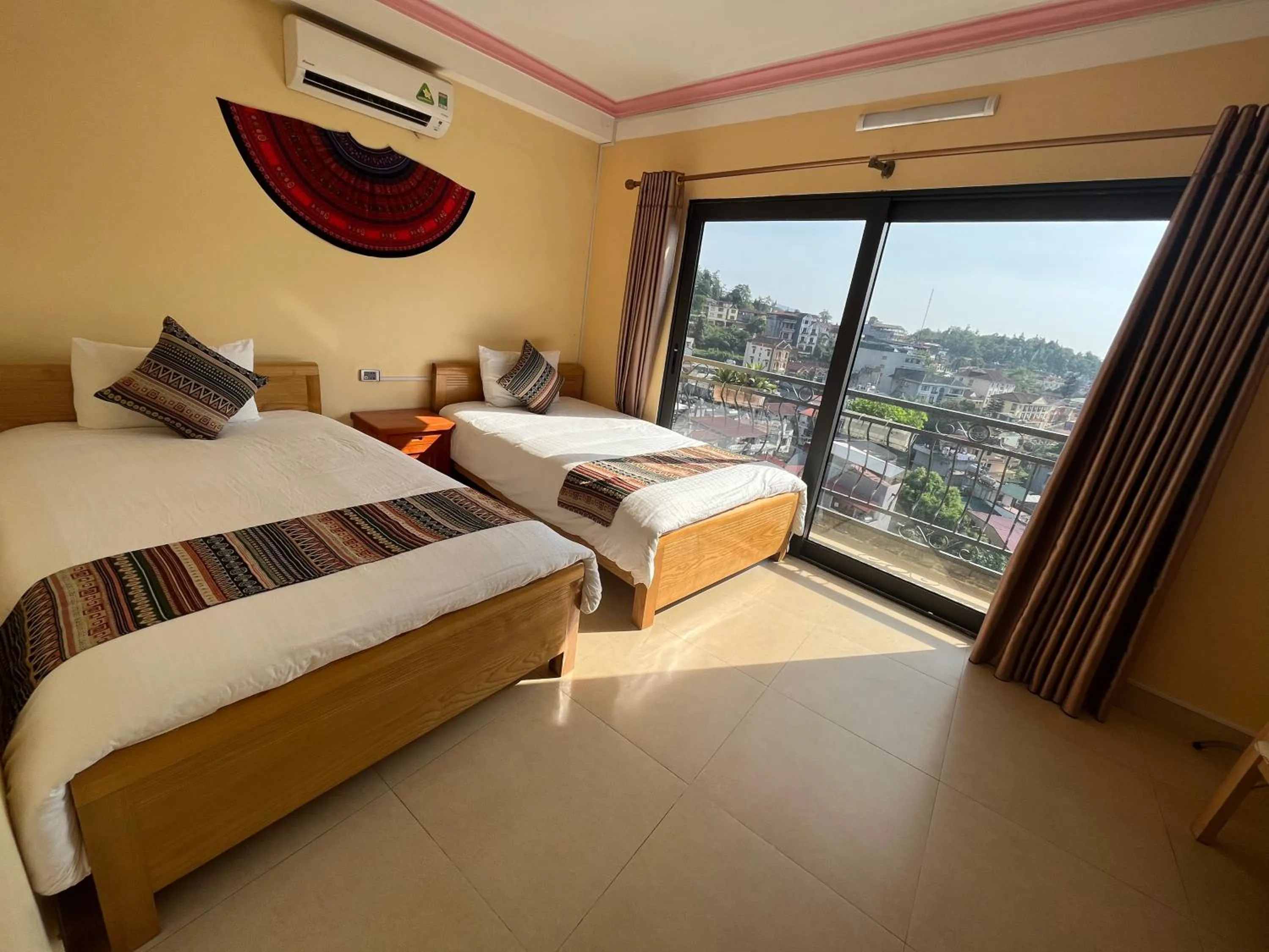 Bed in HAPPY FAMILY HOTEL