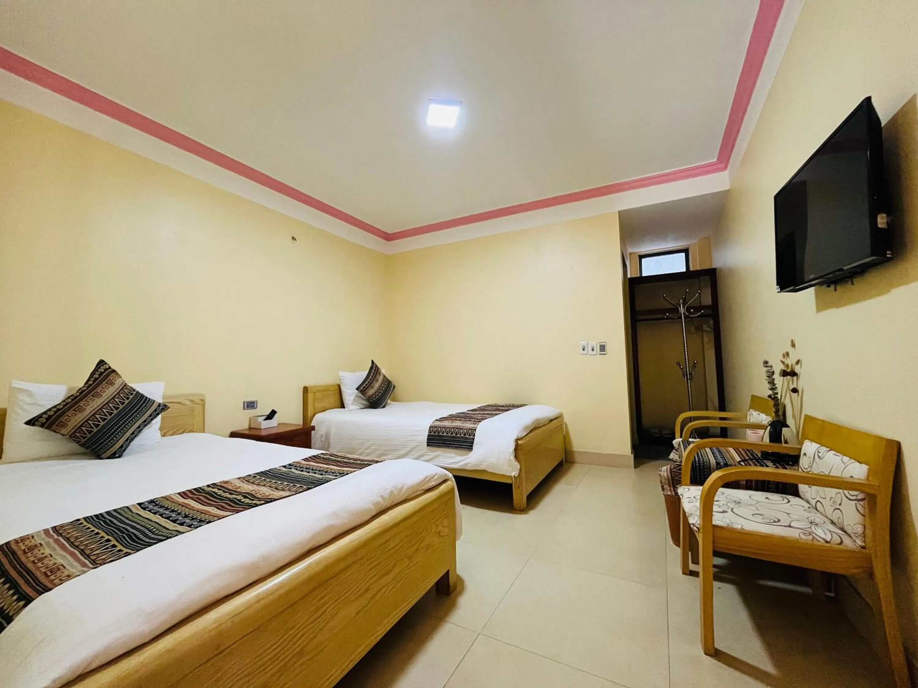 Bed in HAPPY FAMILY HOTEL