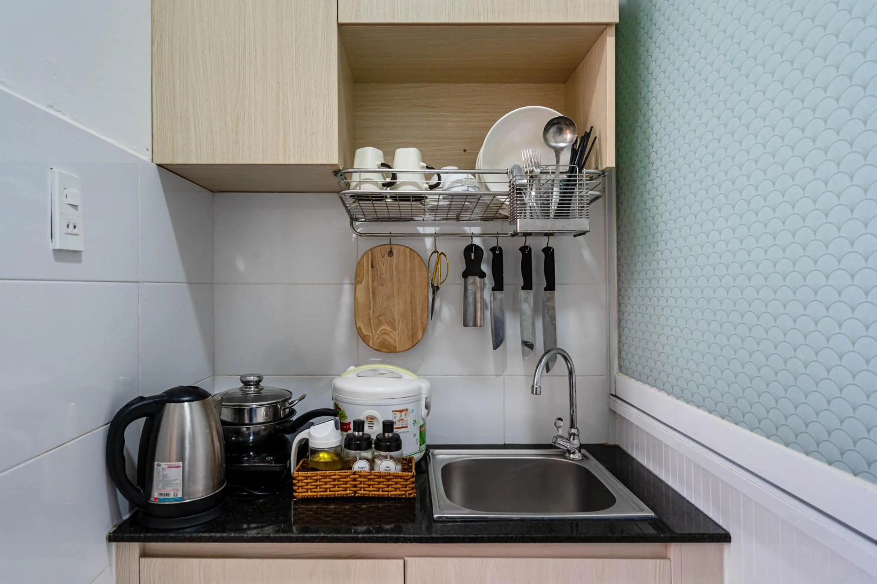 Kitchen or kitchenette in We Home Nguyen Trai