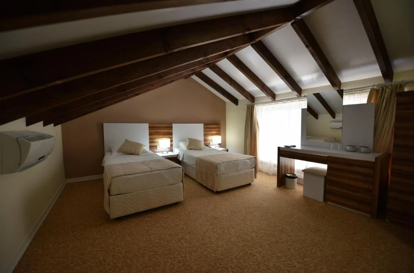 Bed in Sahra Su Holiday Village & SPA