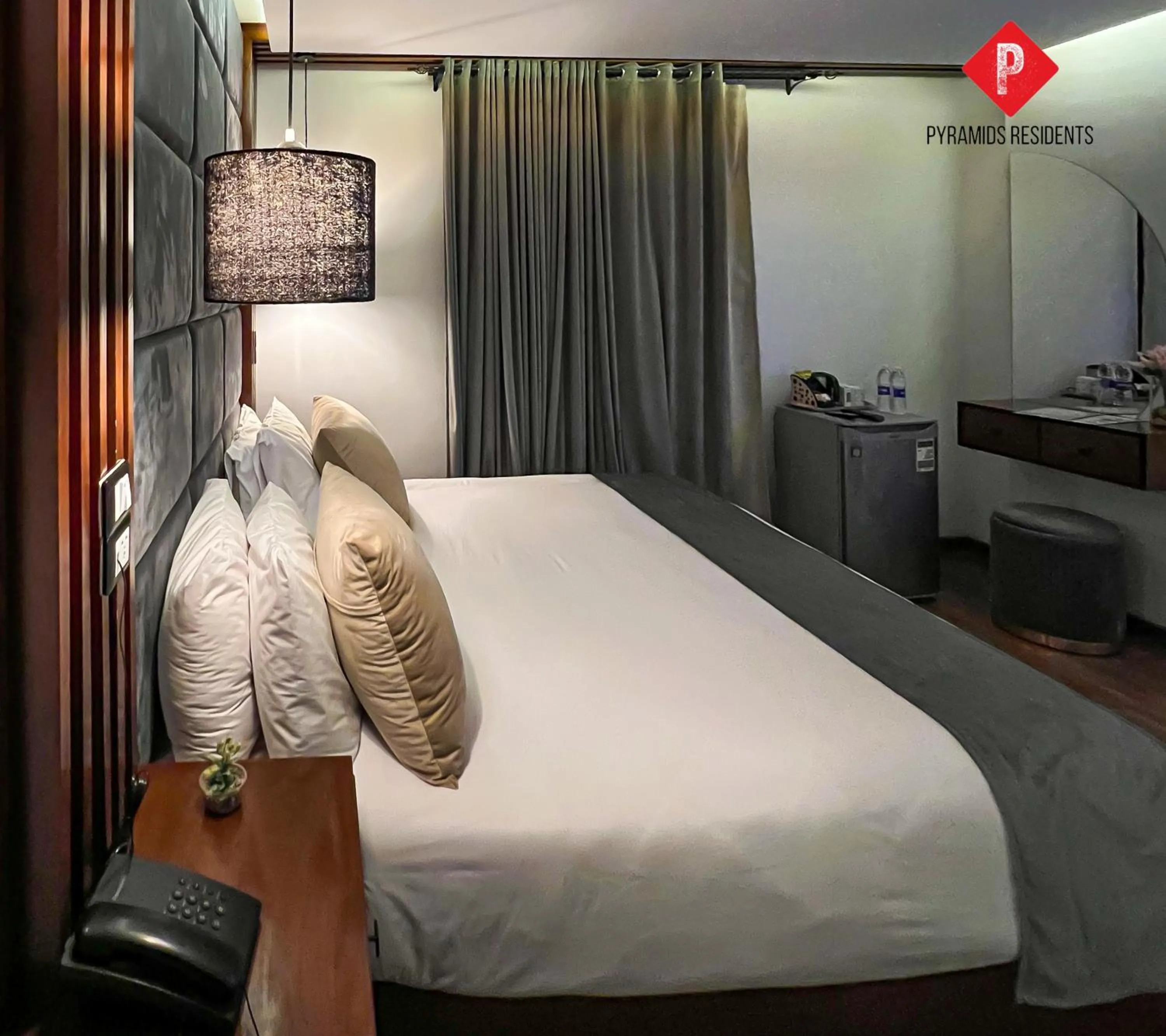 Bed in Pyramids View Guest House