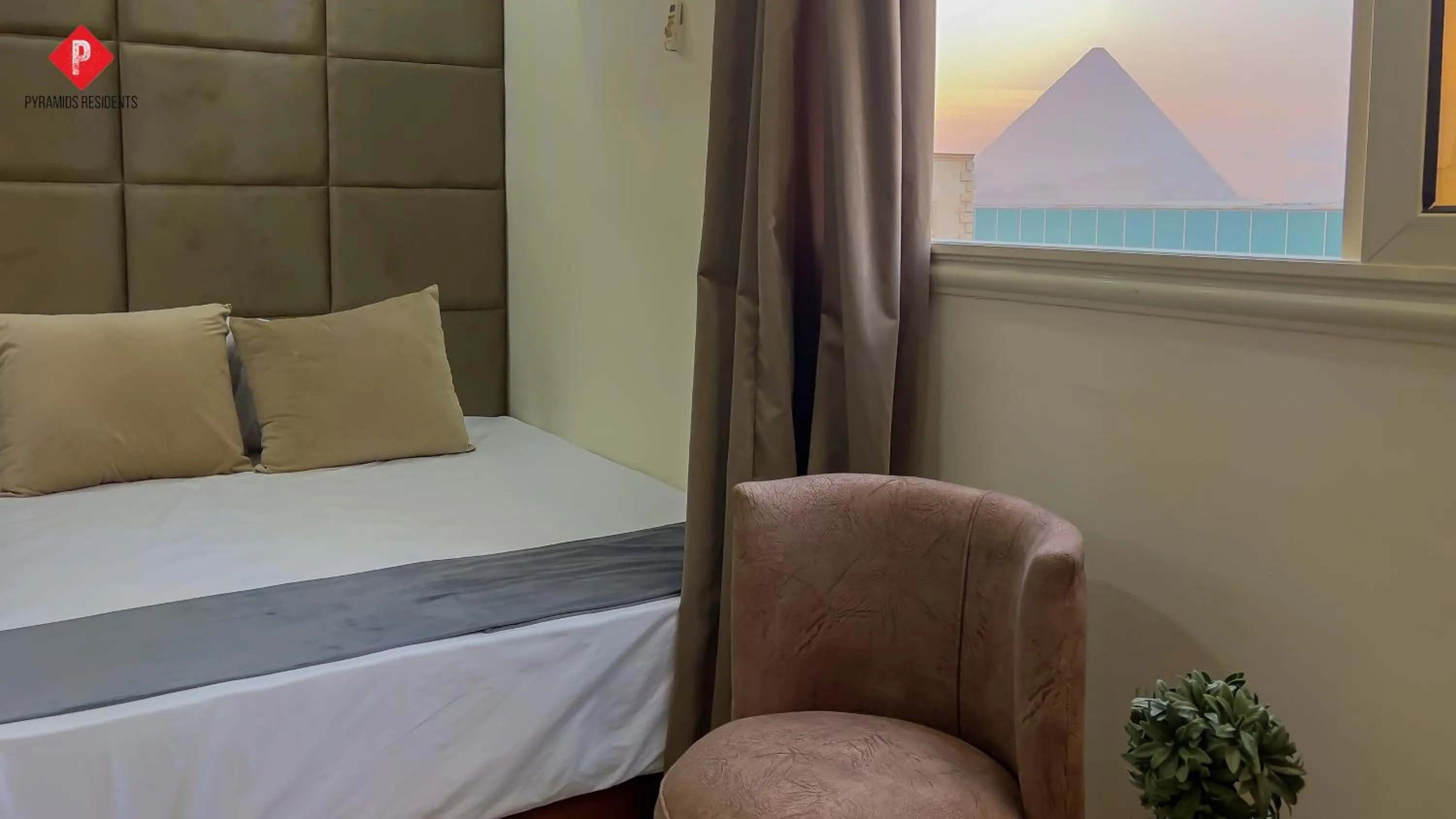 Quiet street view, Bed in Pyramids View Guest House