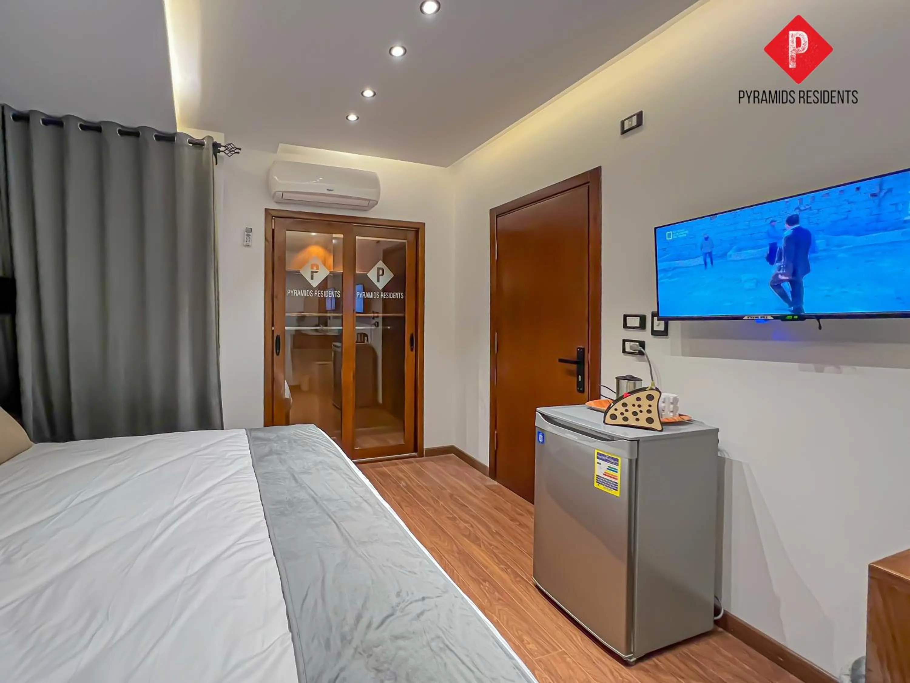 Bed in Pyramids View Guest House