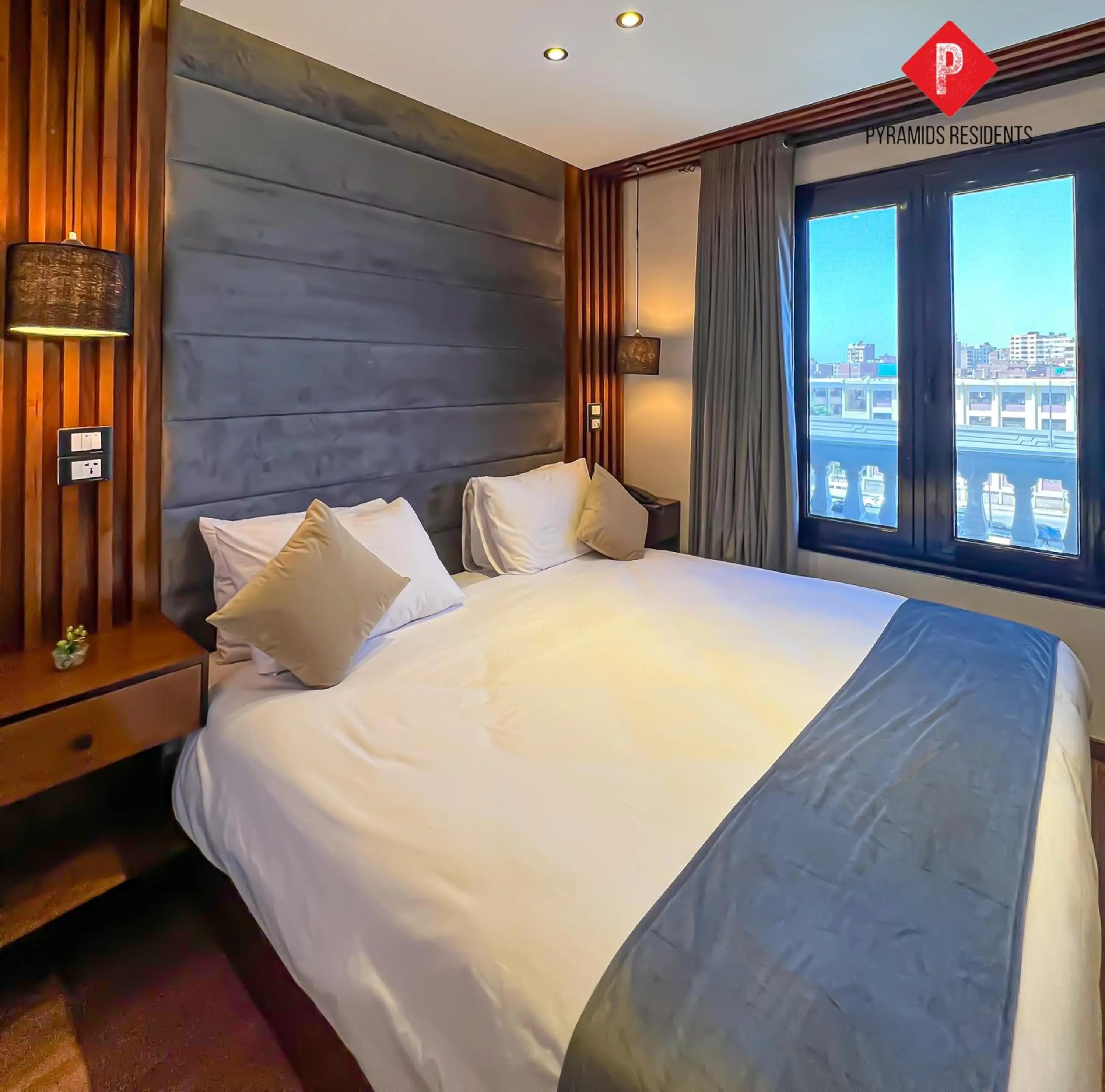 Bed in Pyramids View Guest House