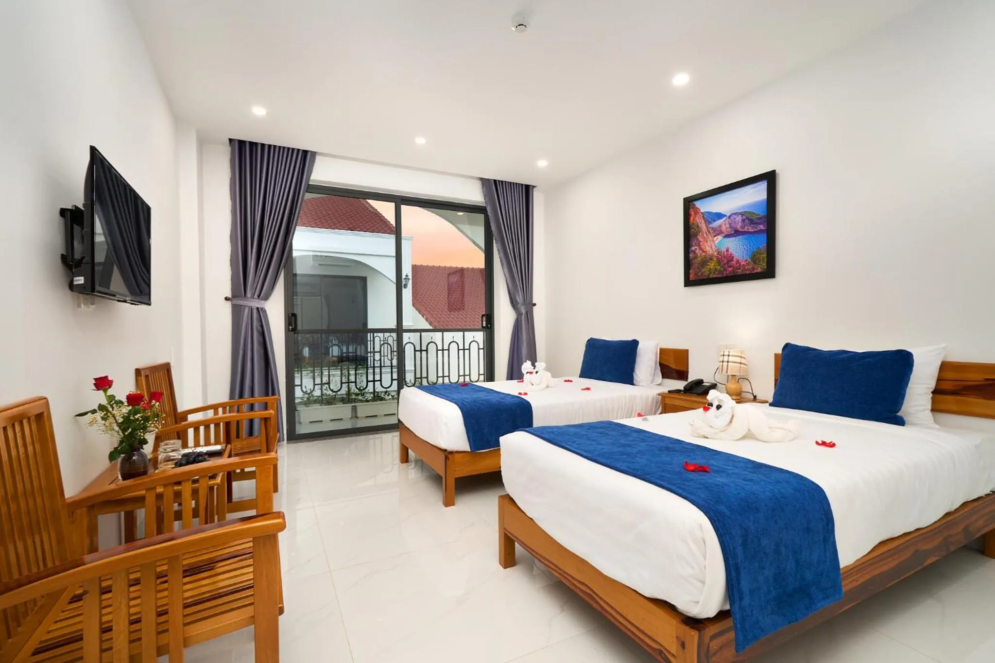 Communal lounge/ TV room, Bed in Hoi An Legend Charm Boutique Hoi An Hotel