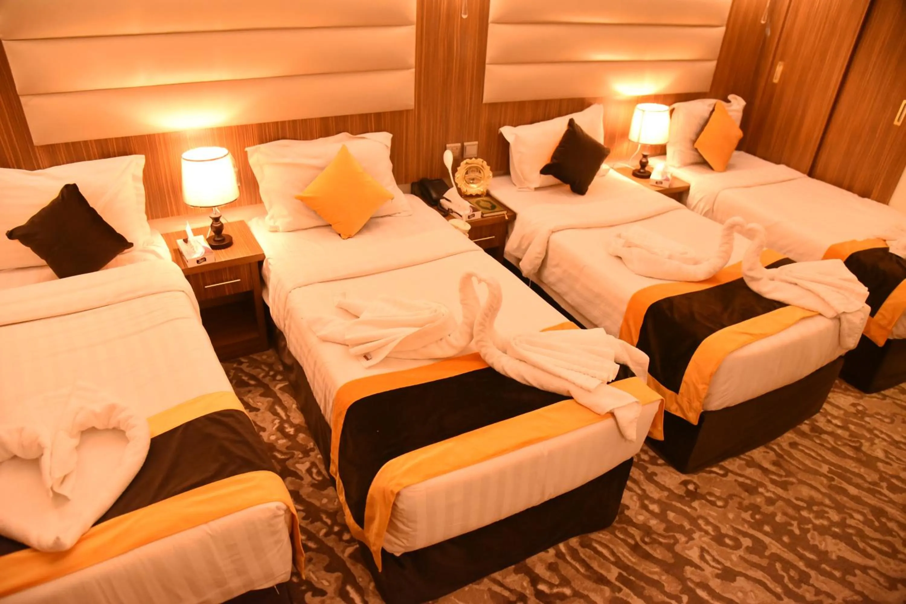 Bed in فندق قصر الاندلس الذهبي - Alandalus golden palace Hotel