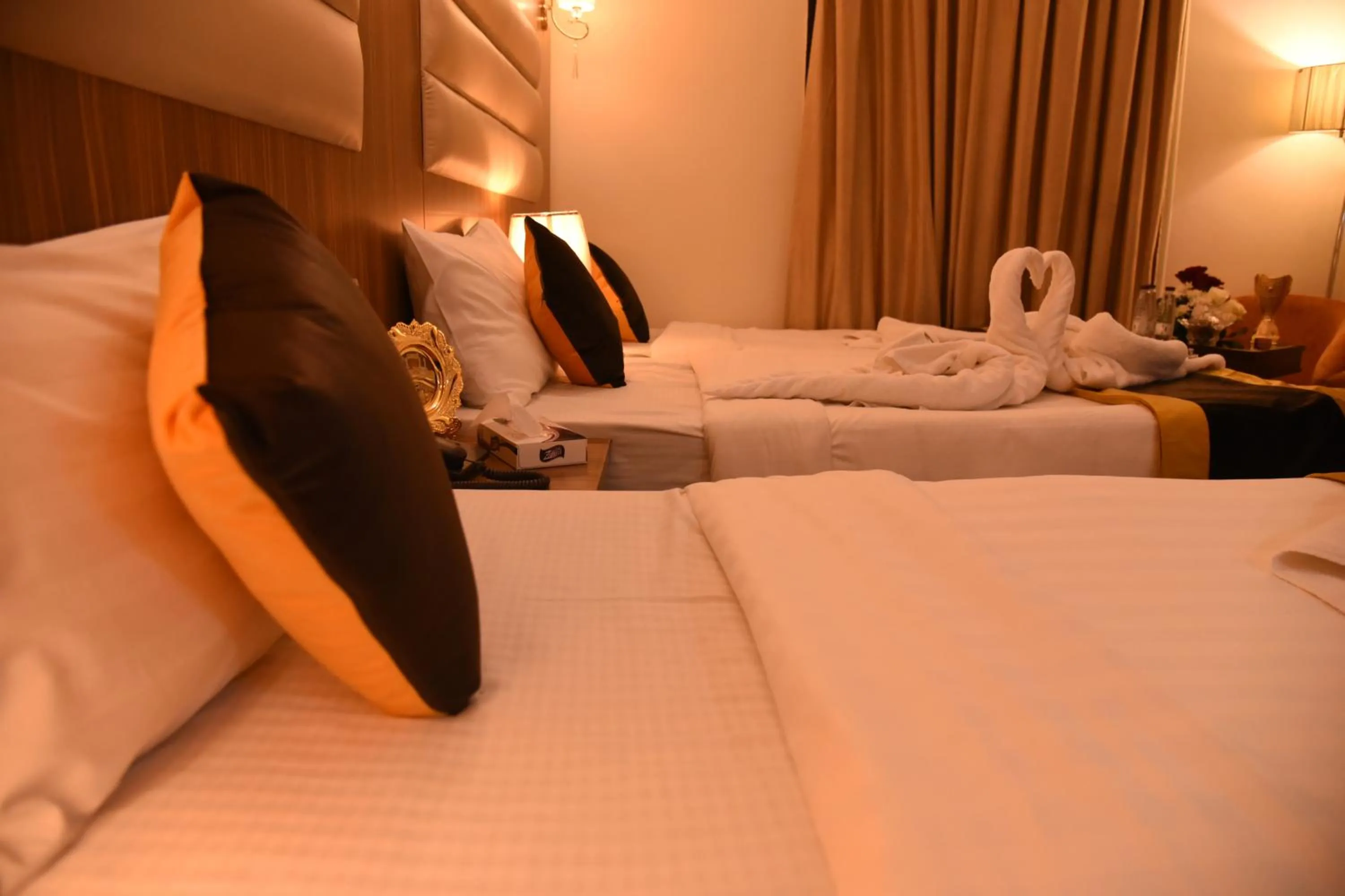 Bed in فندق قصر الاندلس الذهبي - Alandalus golden palace Hotel