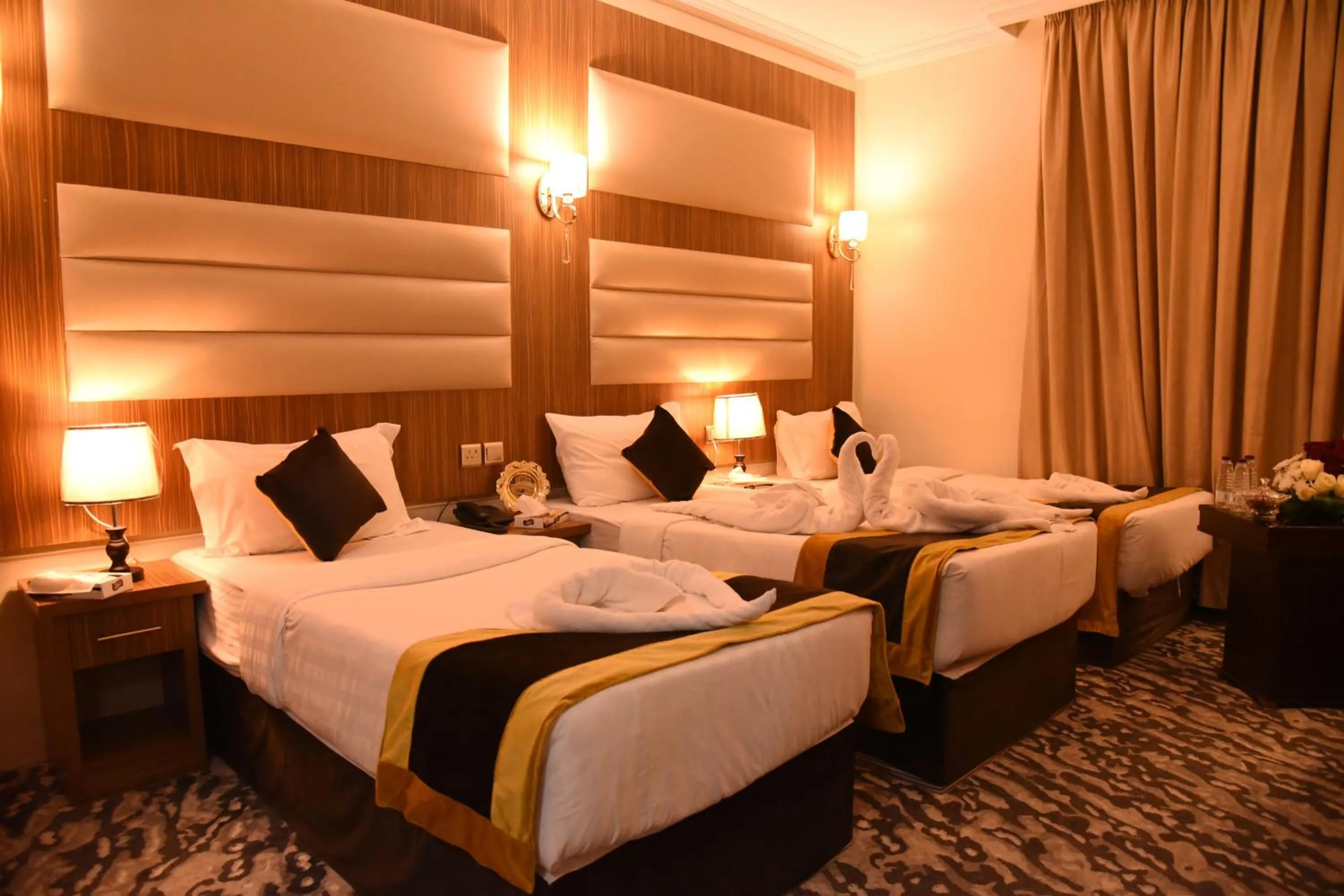 Bed in فندق قصر الاندلس الذهبي - Alandalus golden palace Hotel