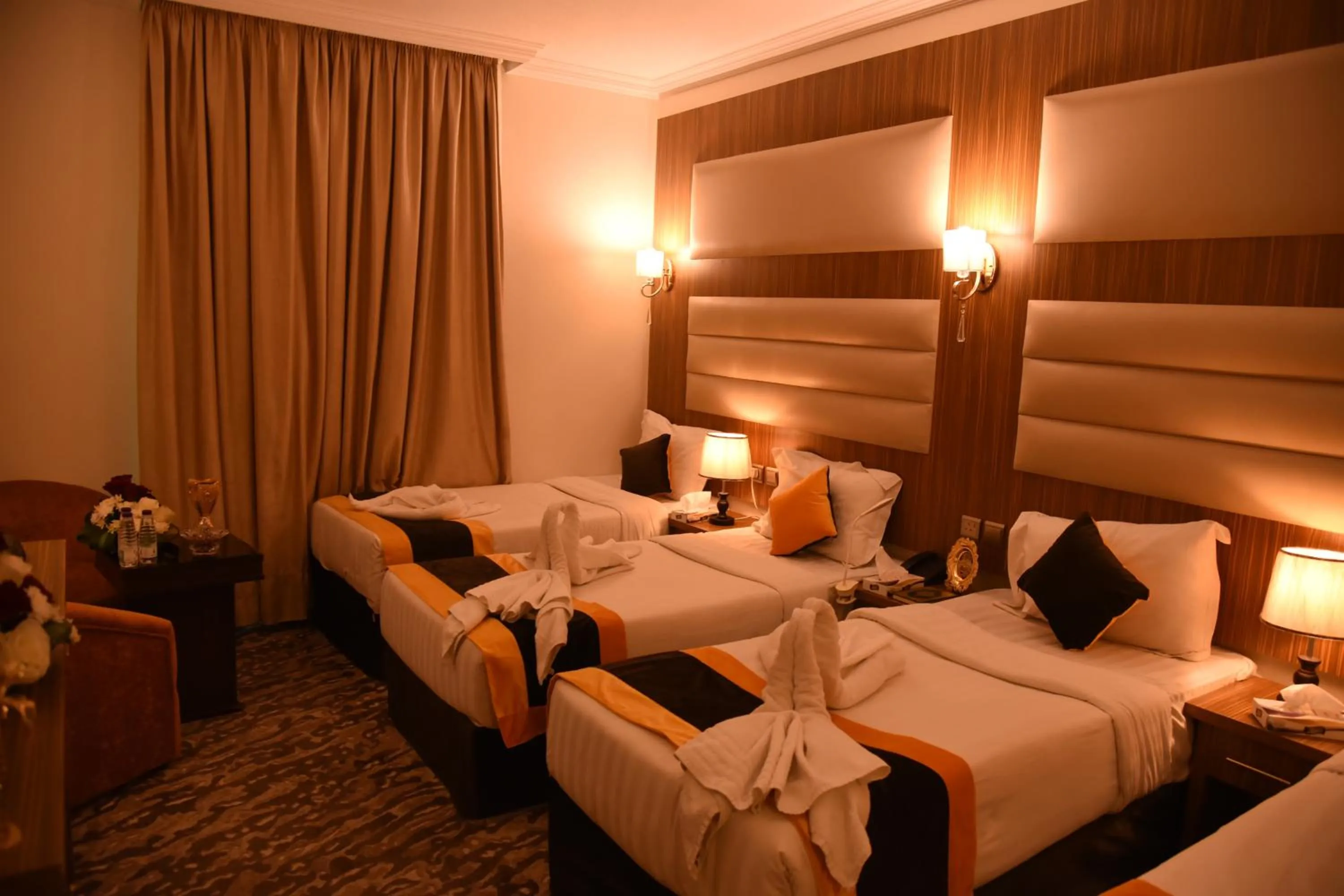 Bed in فندق قصر الاندلس الذهبي - Alandalus golden palace Hotel