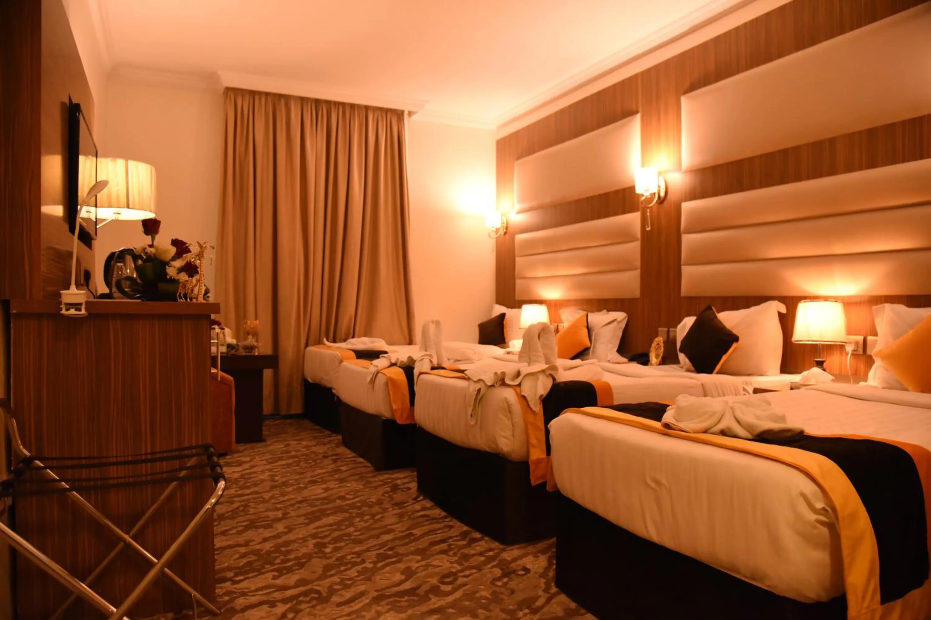 Bed in فندق قصر الاندلس الذهبي - Alandalus golden palace Hotel