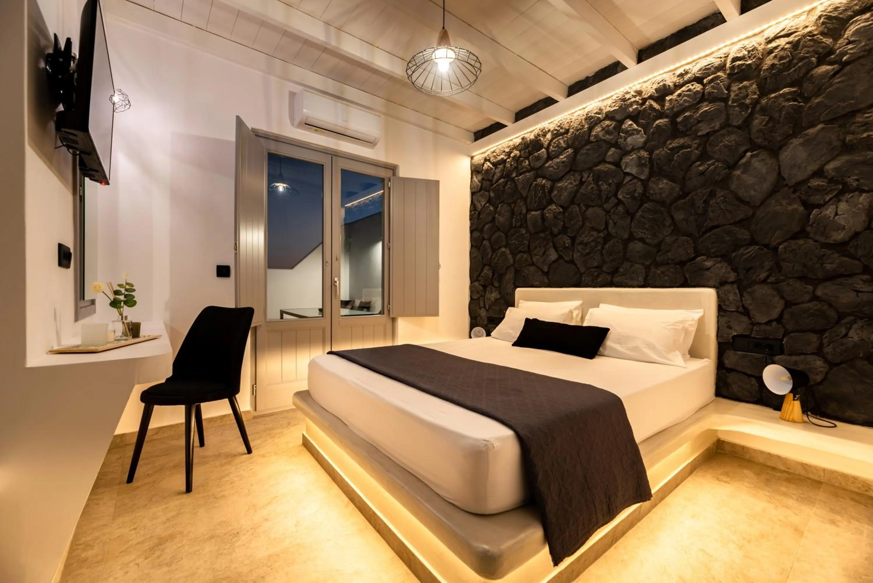Bed in Filoxenia Luxury Villas