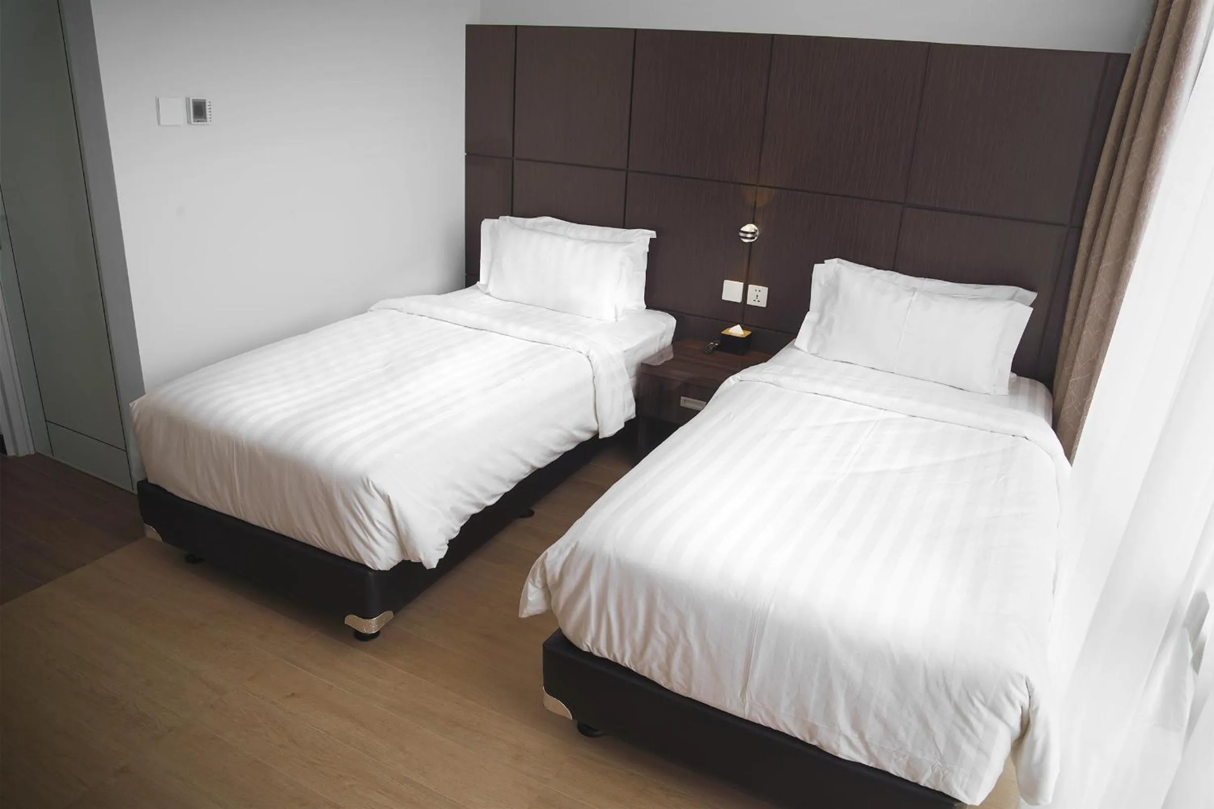 Bed in Dreamtel Jakarta