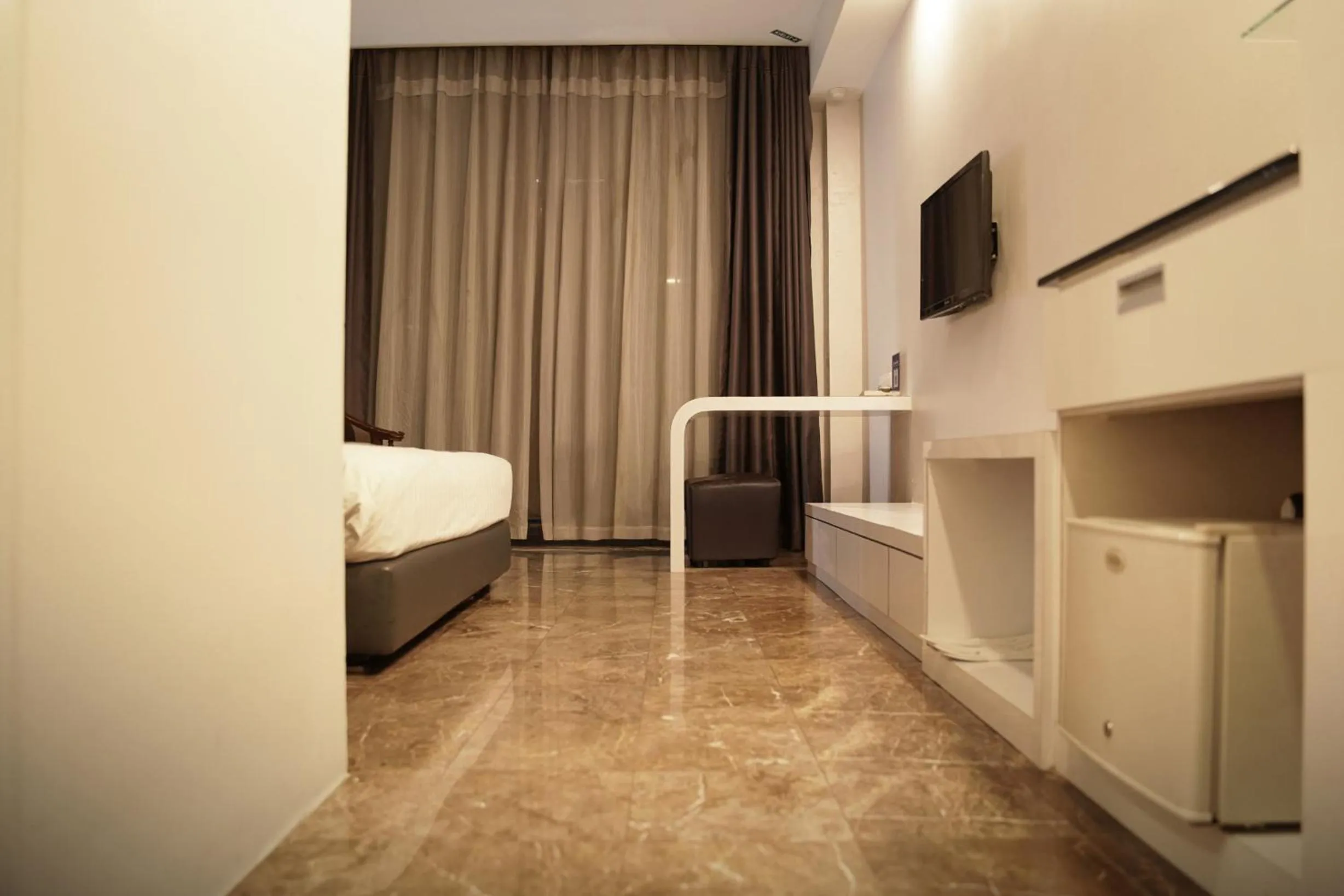 Bed in Dreamtel Jakarta