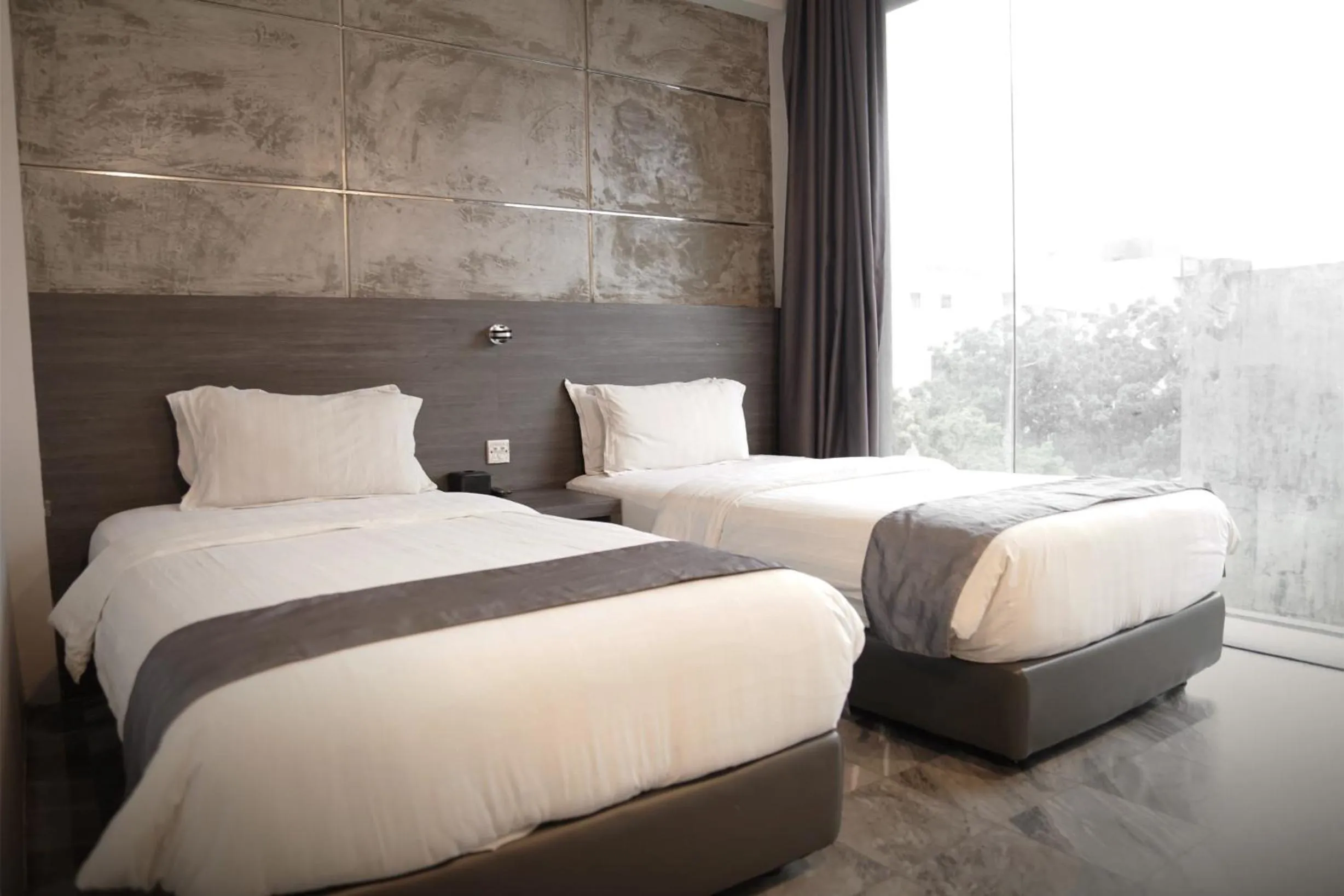 Bed in Dreamtel Jakarta