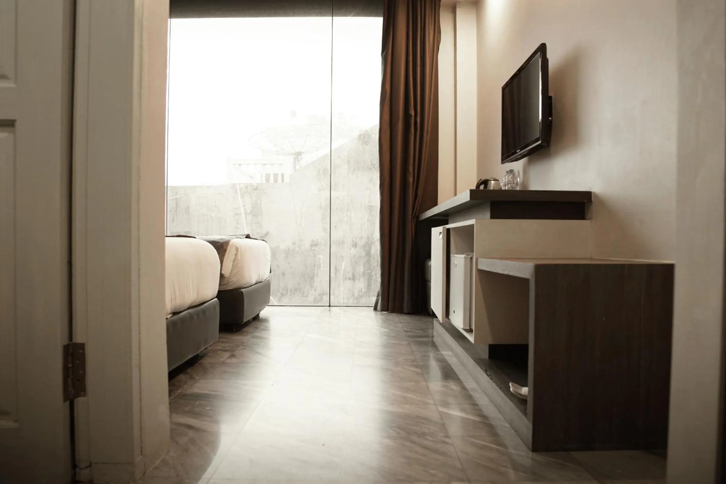 Bed in Dreamtel Jakarta