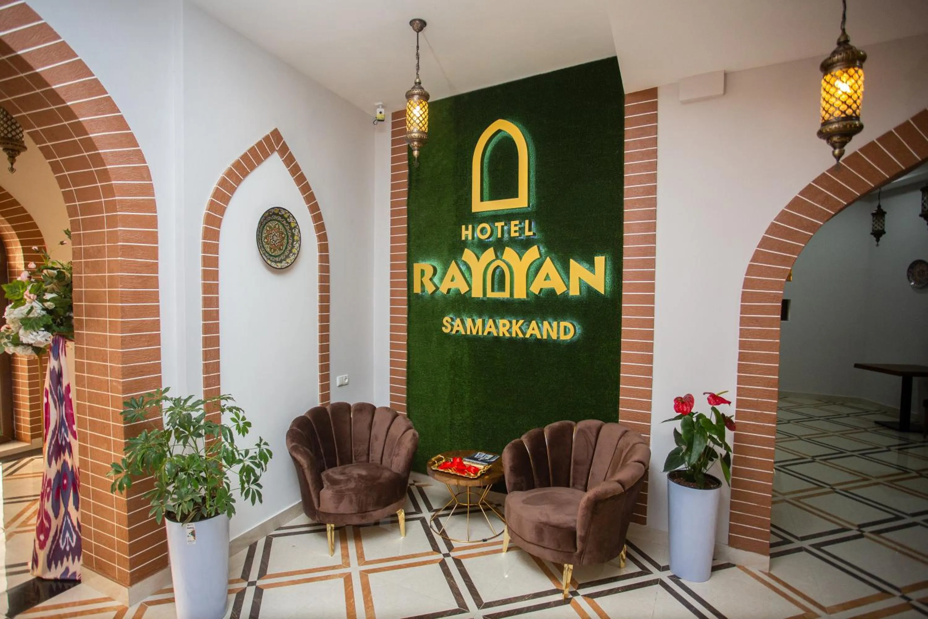 Property logo or sign in Rayyan Hotel Samarkand