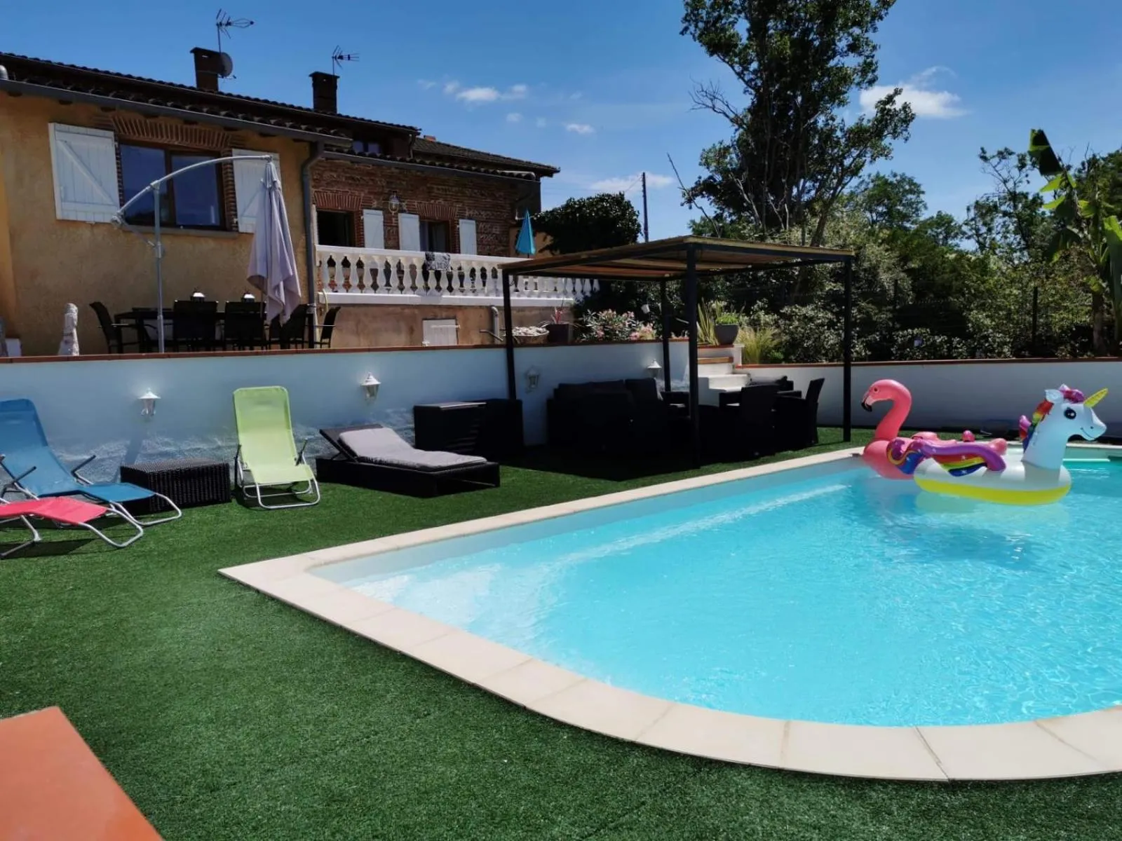 Swimming pool in La maison d'Hôtes Du Moulin