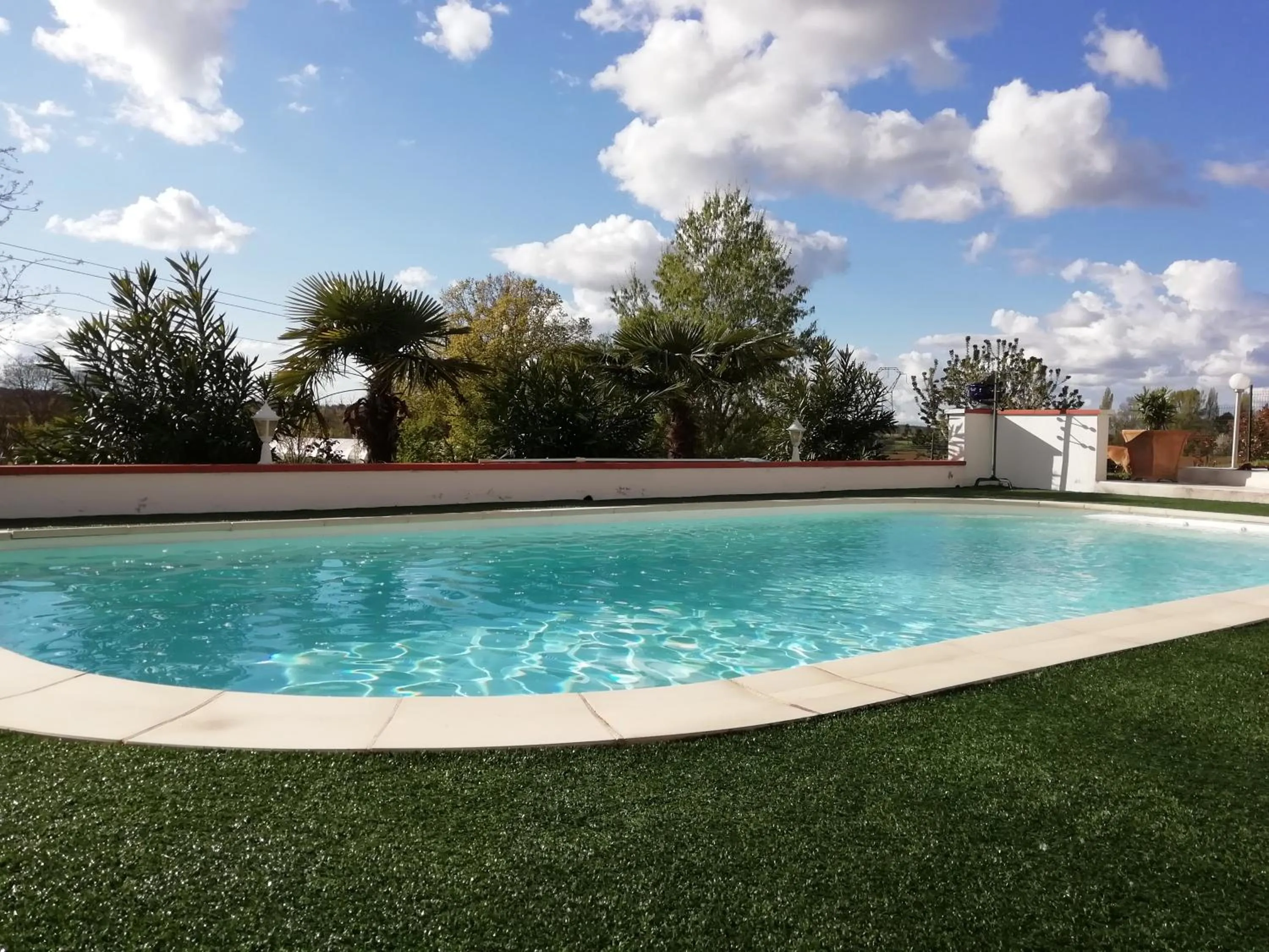 Swimming pool in La maison d'Hôtes Du Moulin