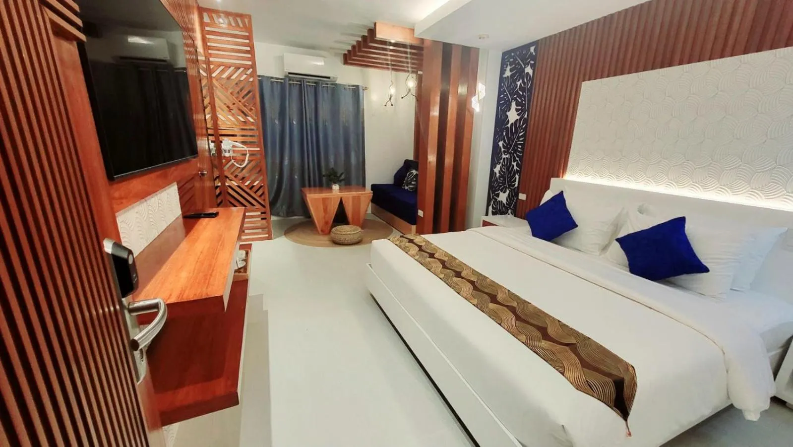 Bed in The Paragon Boracay Suites
