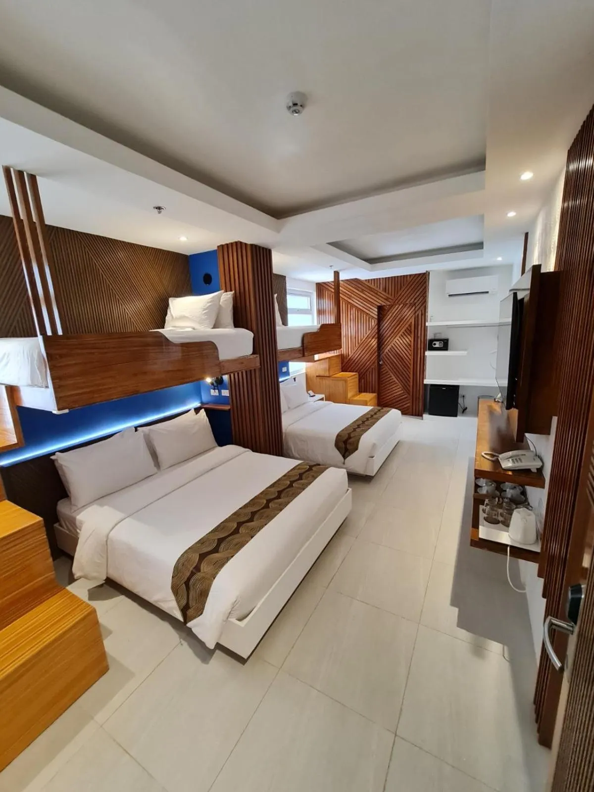 Bed in The Paragon Boracay Suites