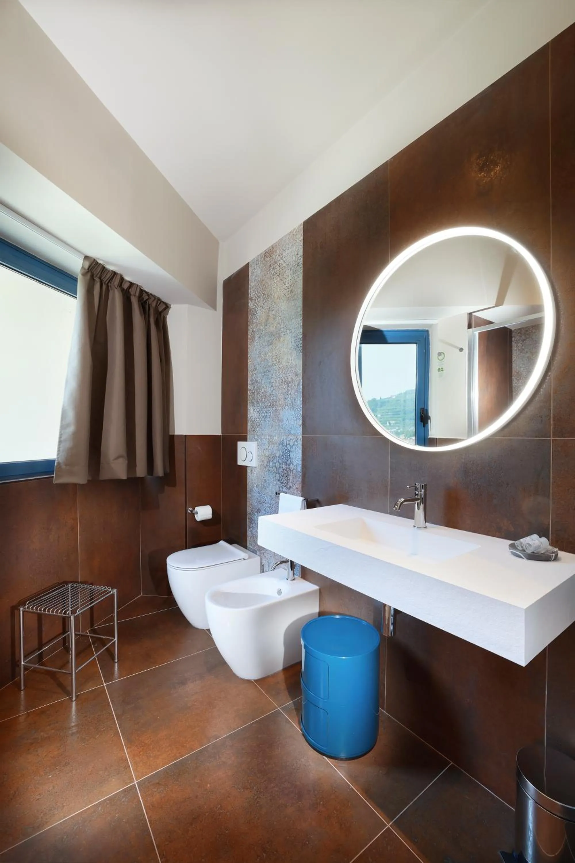 Toilet in Tuscany Inn