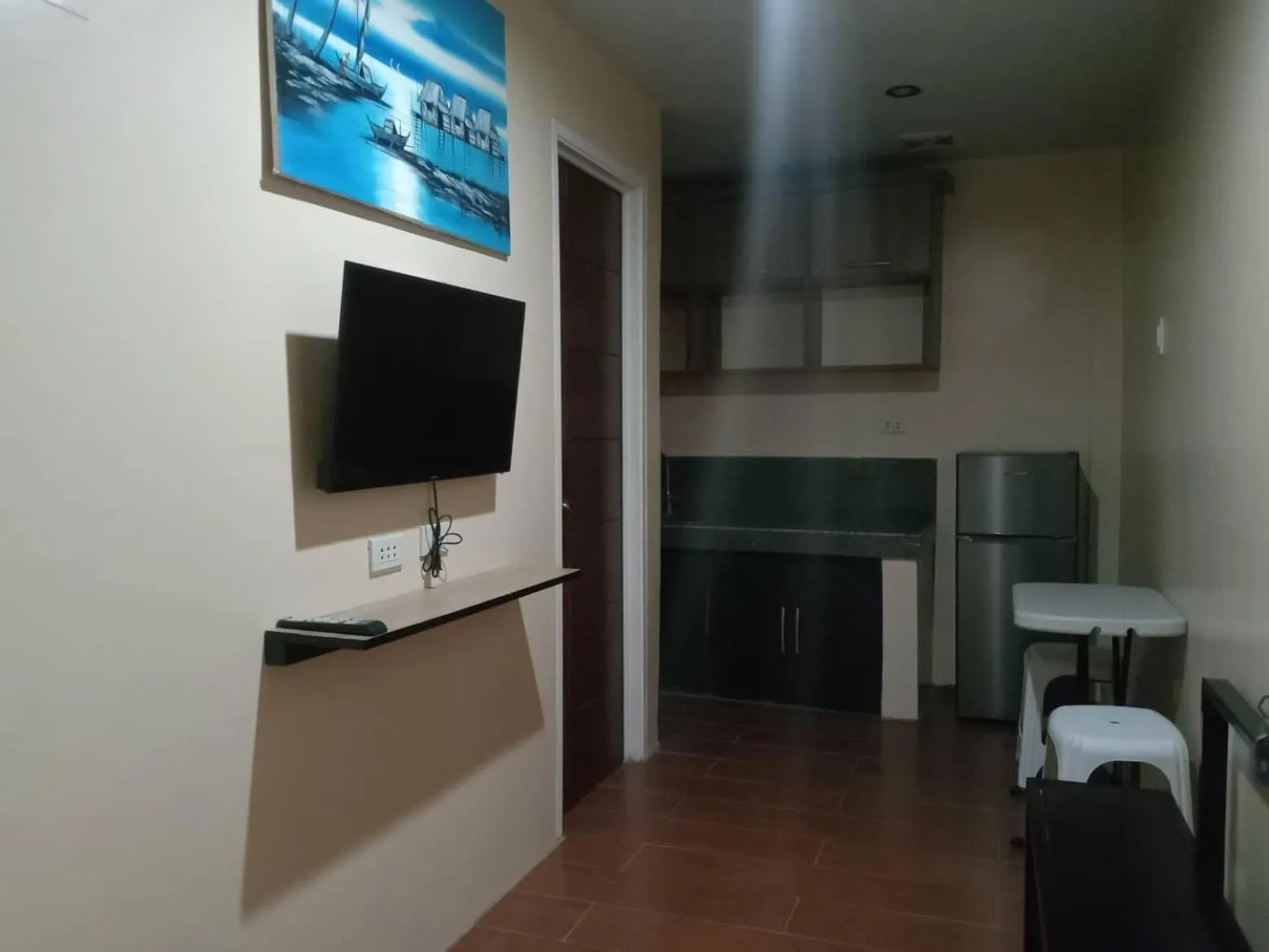 TV and multimedia in RedDoorz @ JJ & KAYE APARTMENT