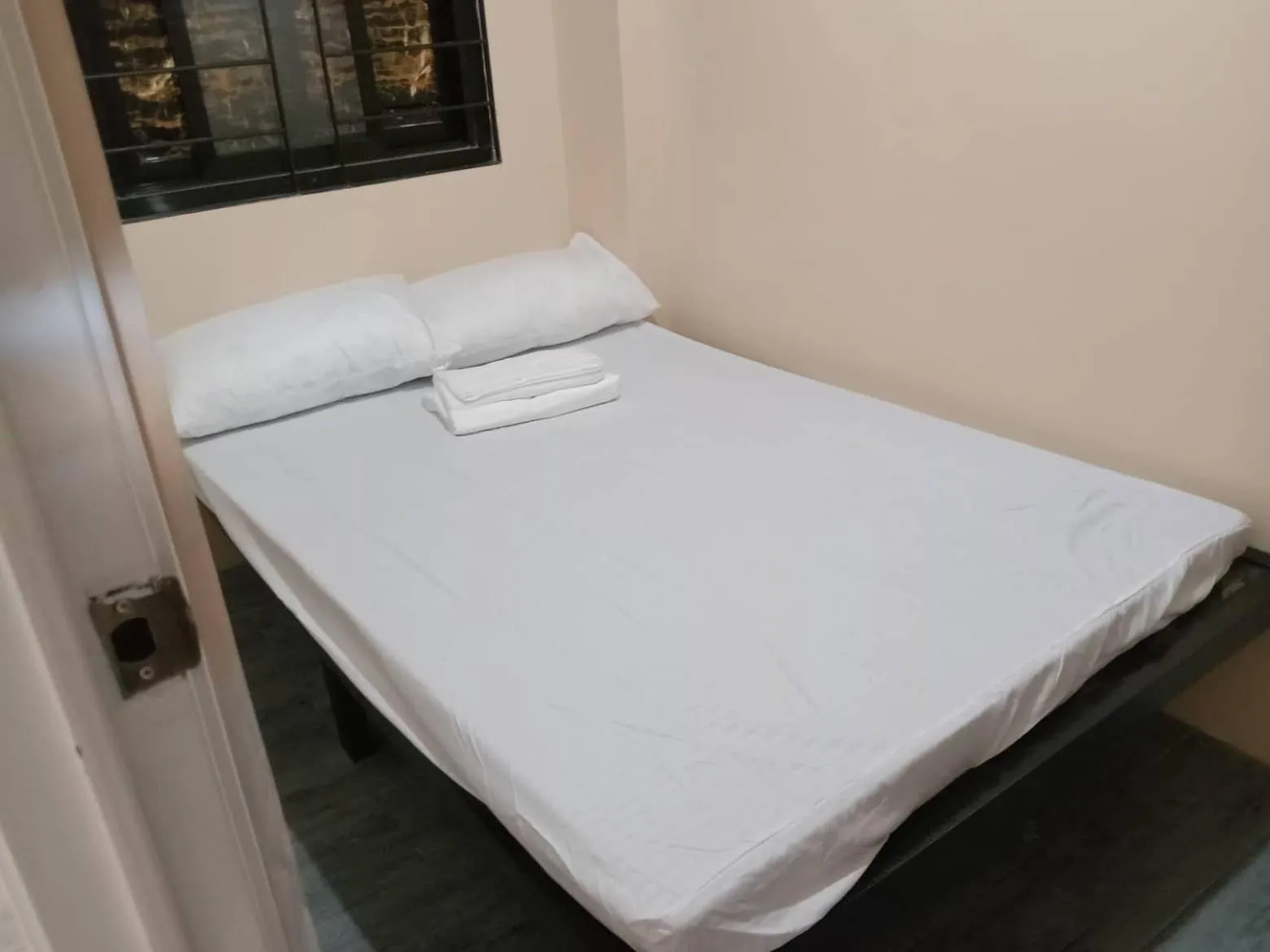 Bed in RedDoorz @ JJ & KAYE APARTMENT