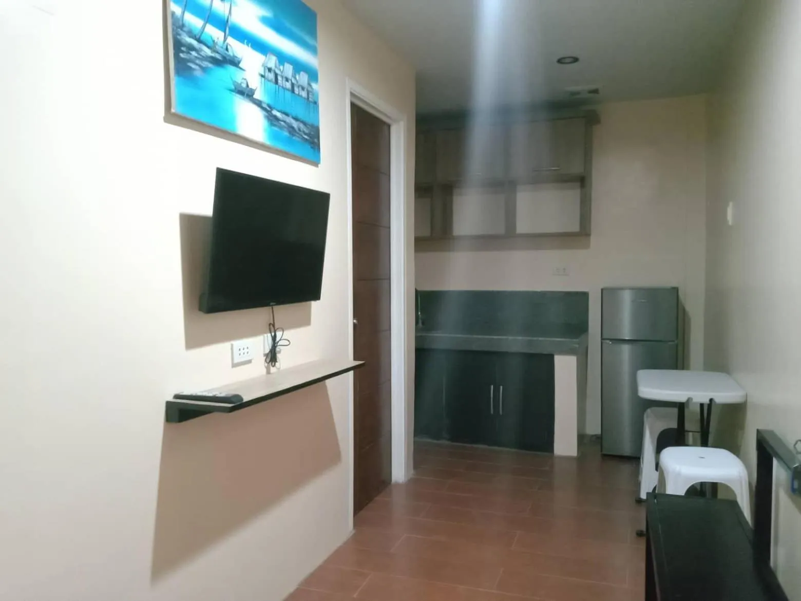 TV and multimedia in RedDoorz @ JJ & KAYE APARTMENT