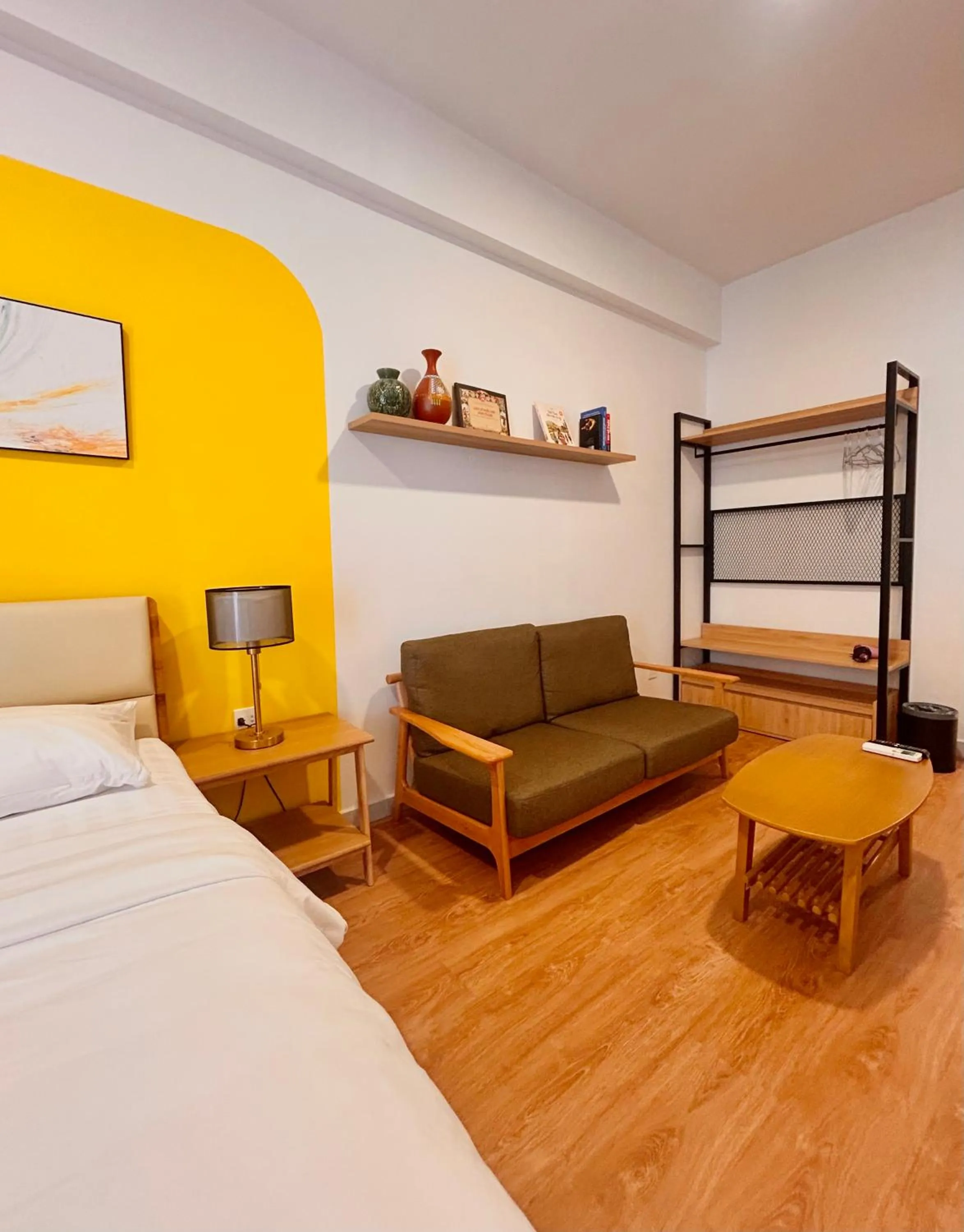 Bed in Soho residence studio apartment