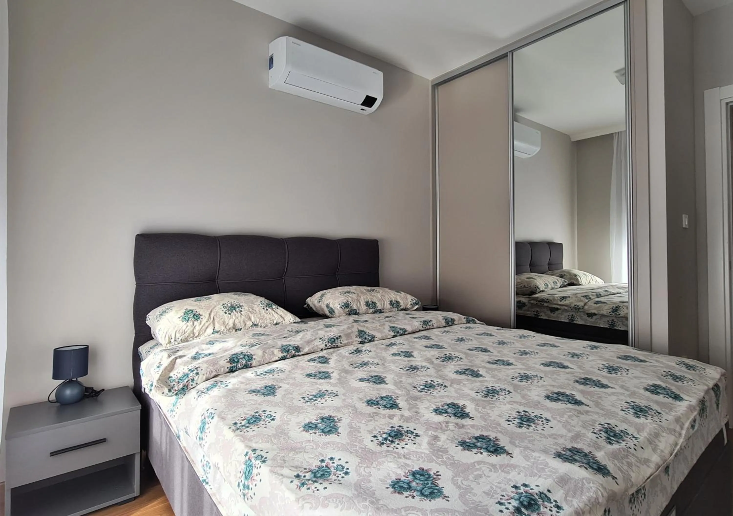 Bed in Green Apartments Podgorica With Garage