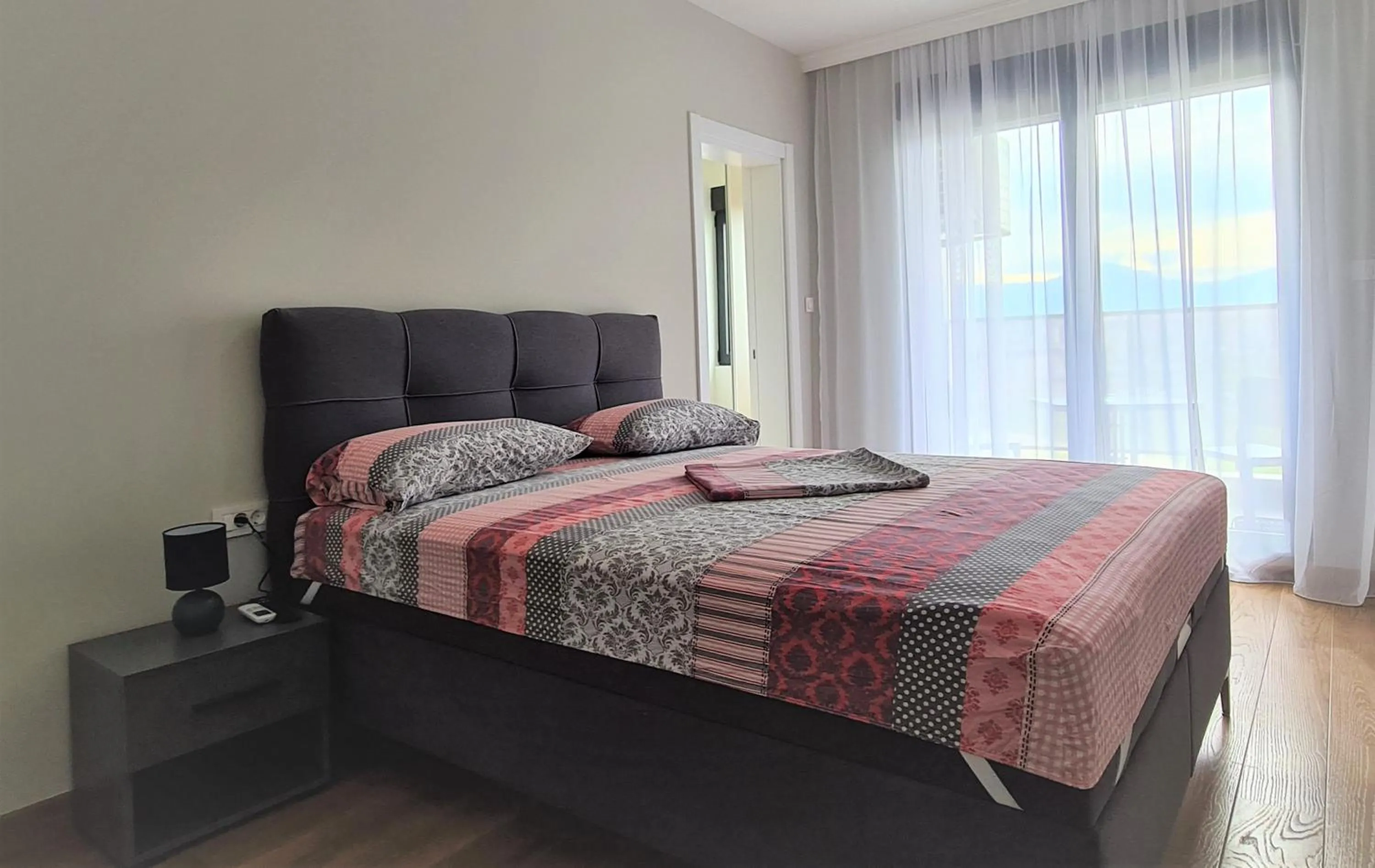 Bed in Green Apartments Podgorica With Garage