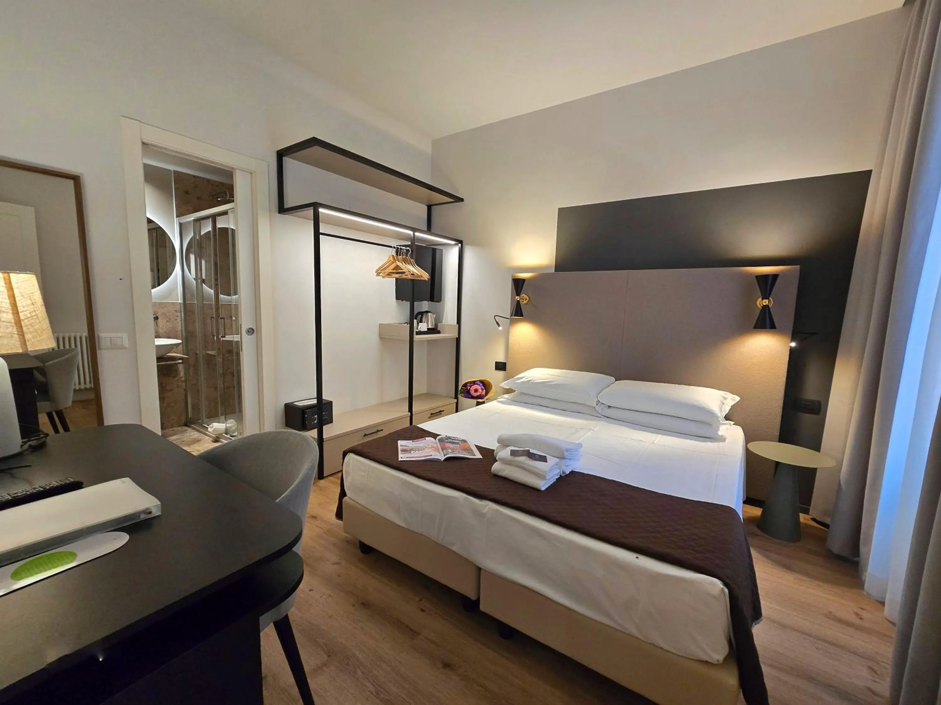 Photo of the whole room, Bed in Hotel Porta Pia