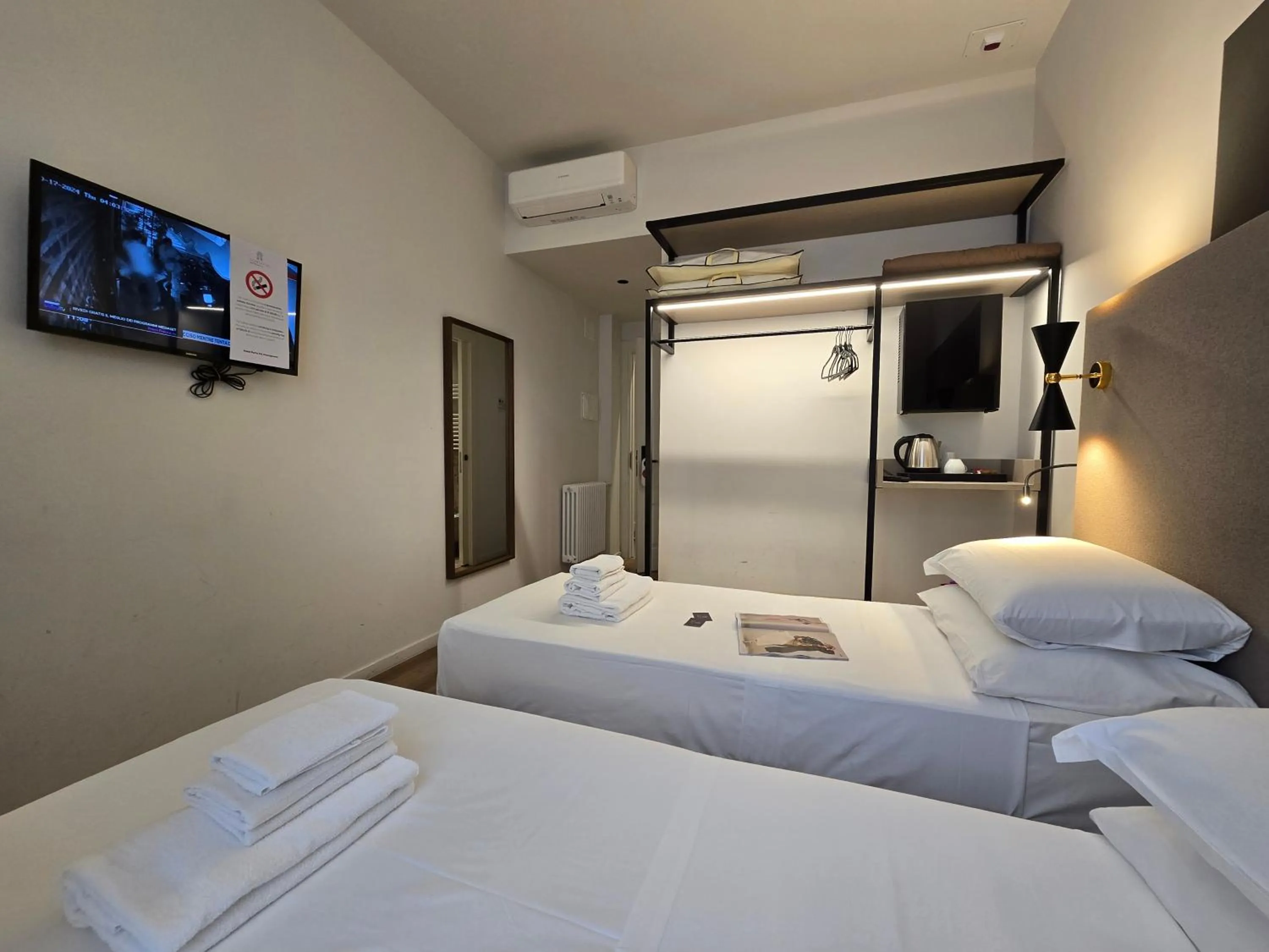 Photo of the whole room, Bed in Hotel Porta Pia