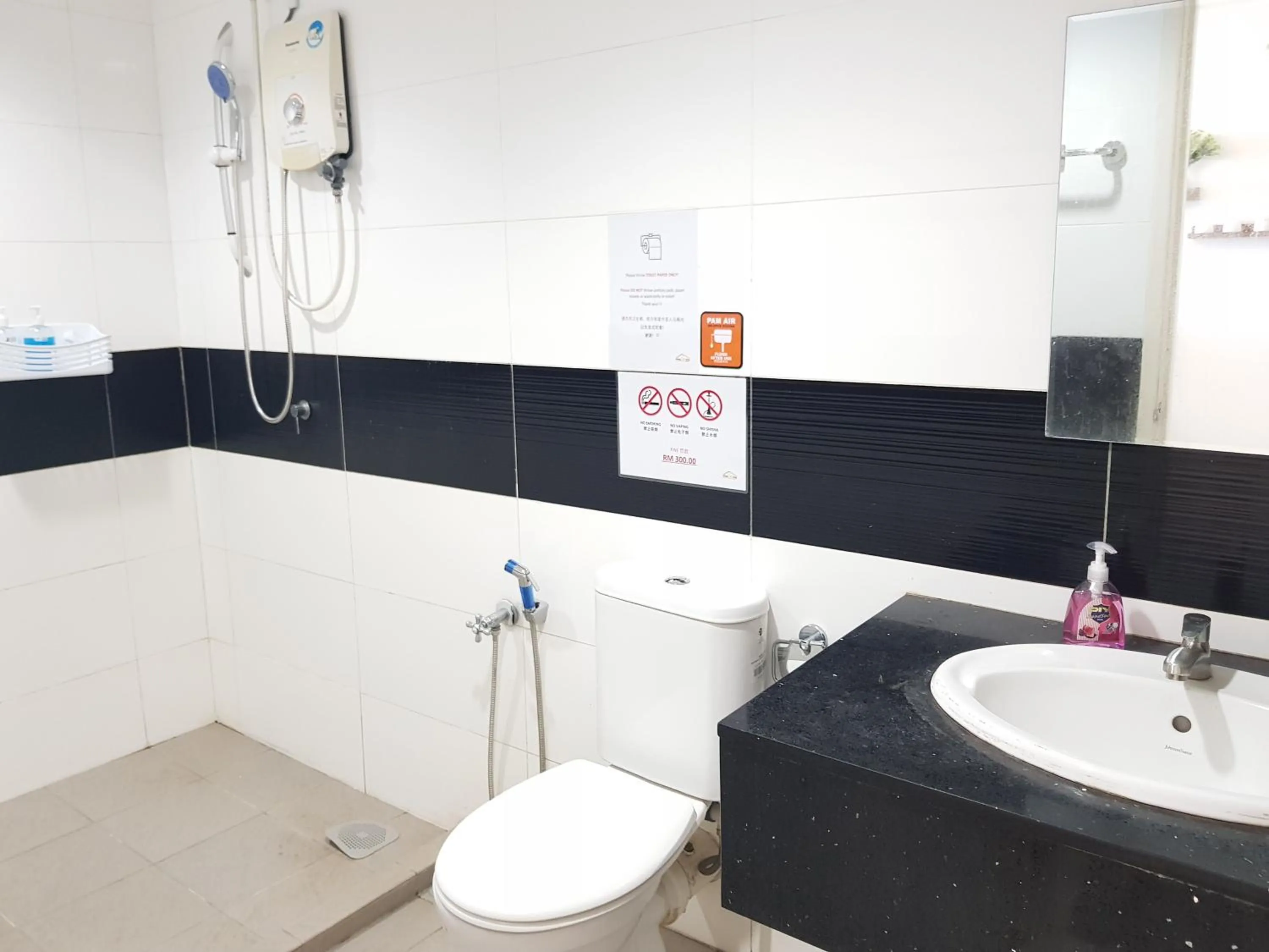 Bathroom in Mansion One Suite by stayCATion Homestay