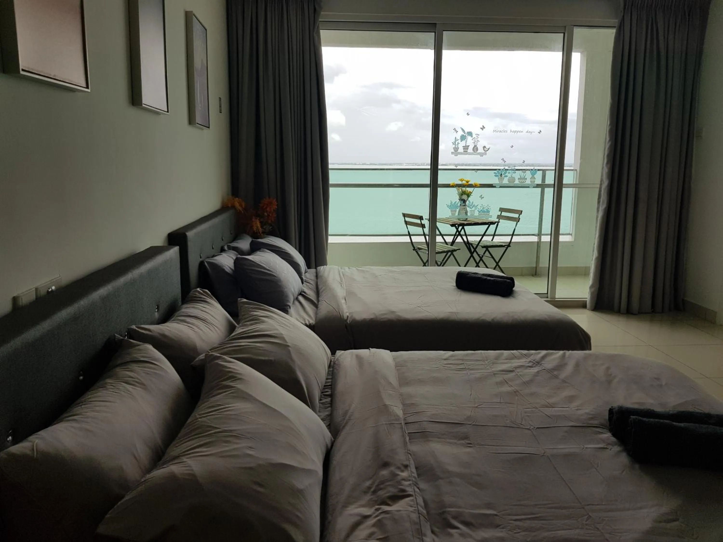 Living room, Bed in Mansion One Suite by stayCATion Homestay