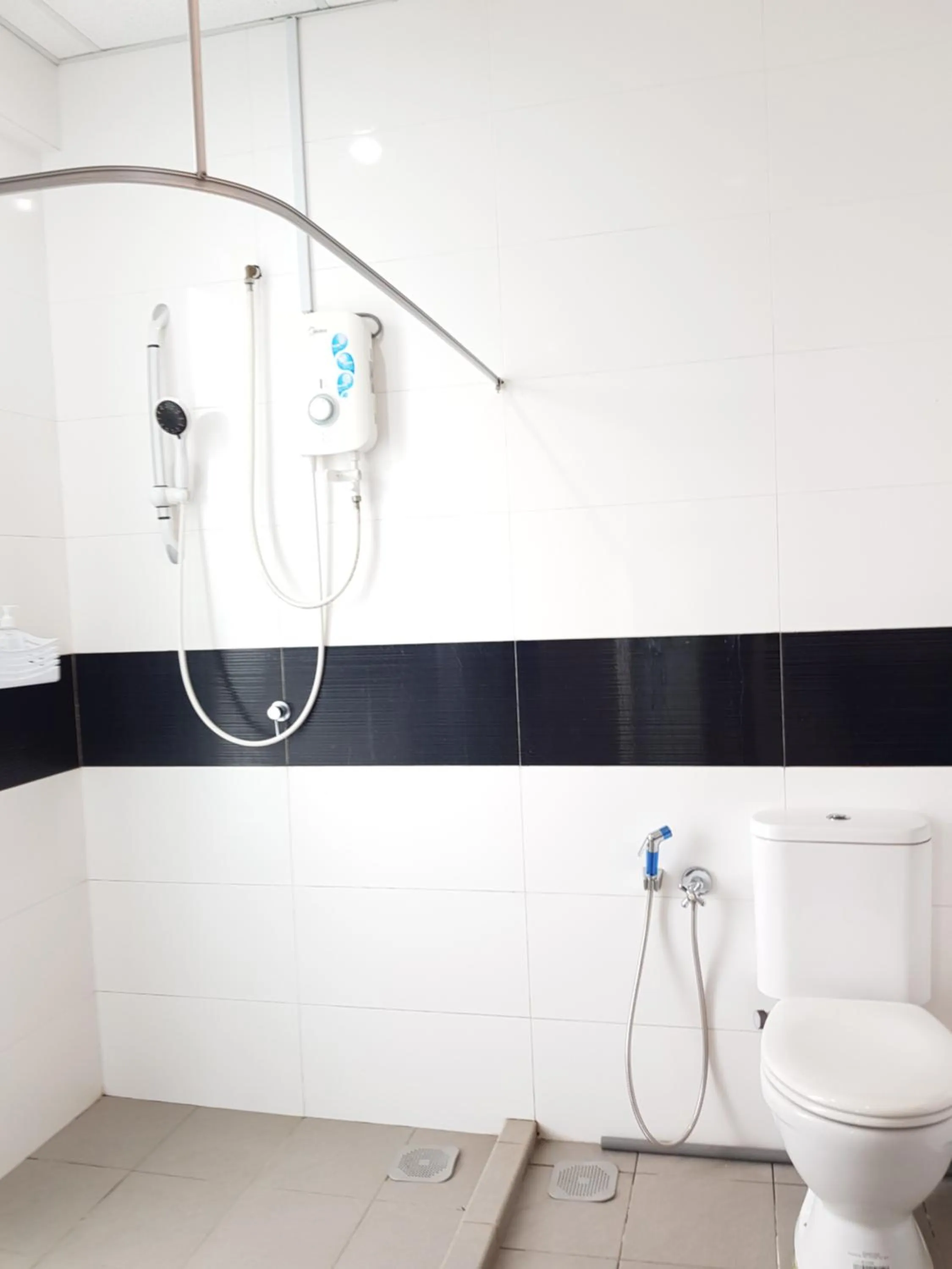 Bathroom in Mansion One Suite by stayCATion Homestay