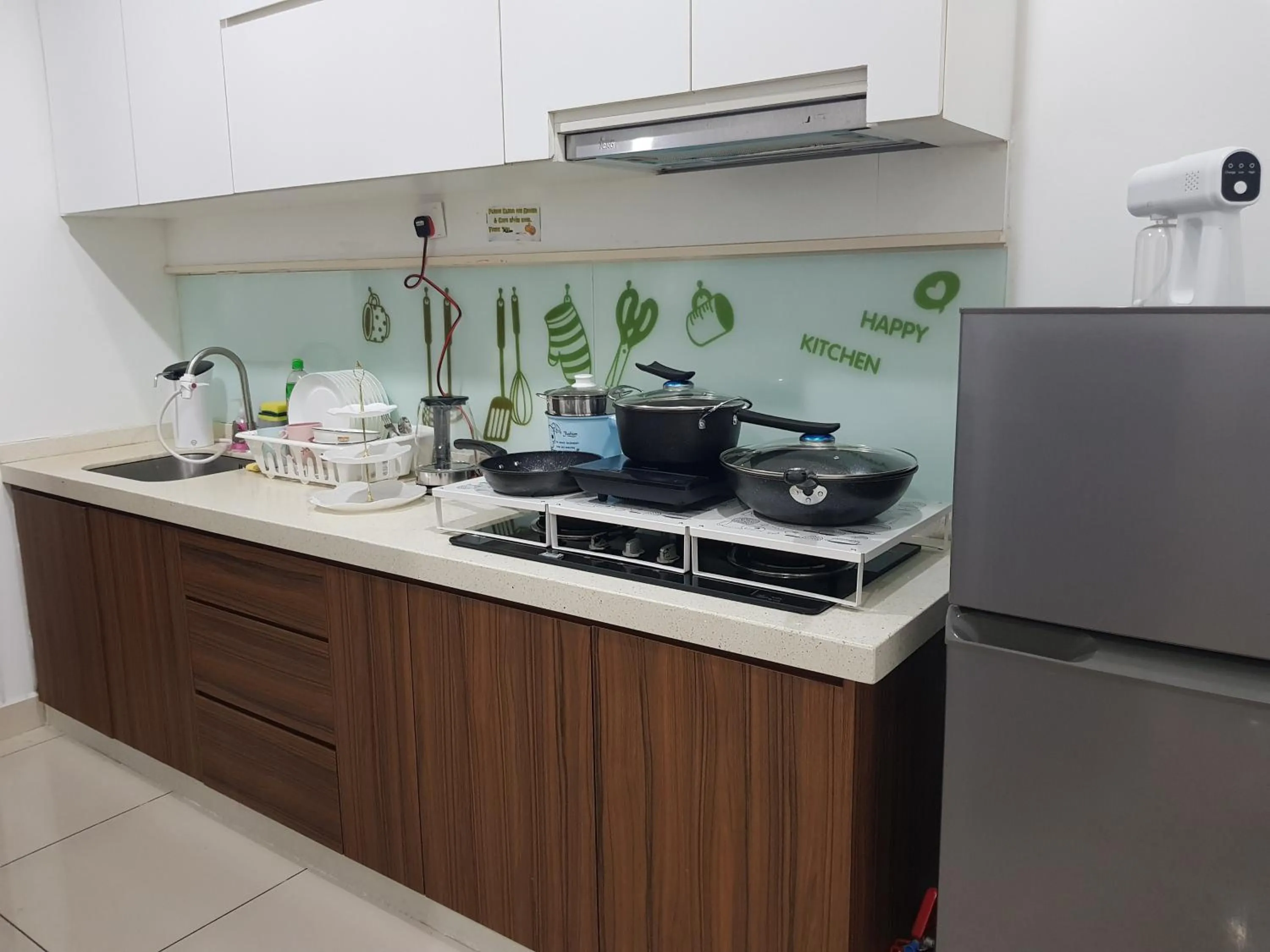 Kitchen or kitchenette in Mansion One Suite by stayCATion Homestay