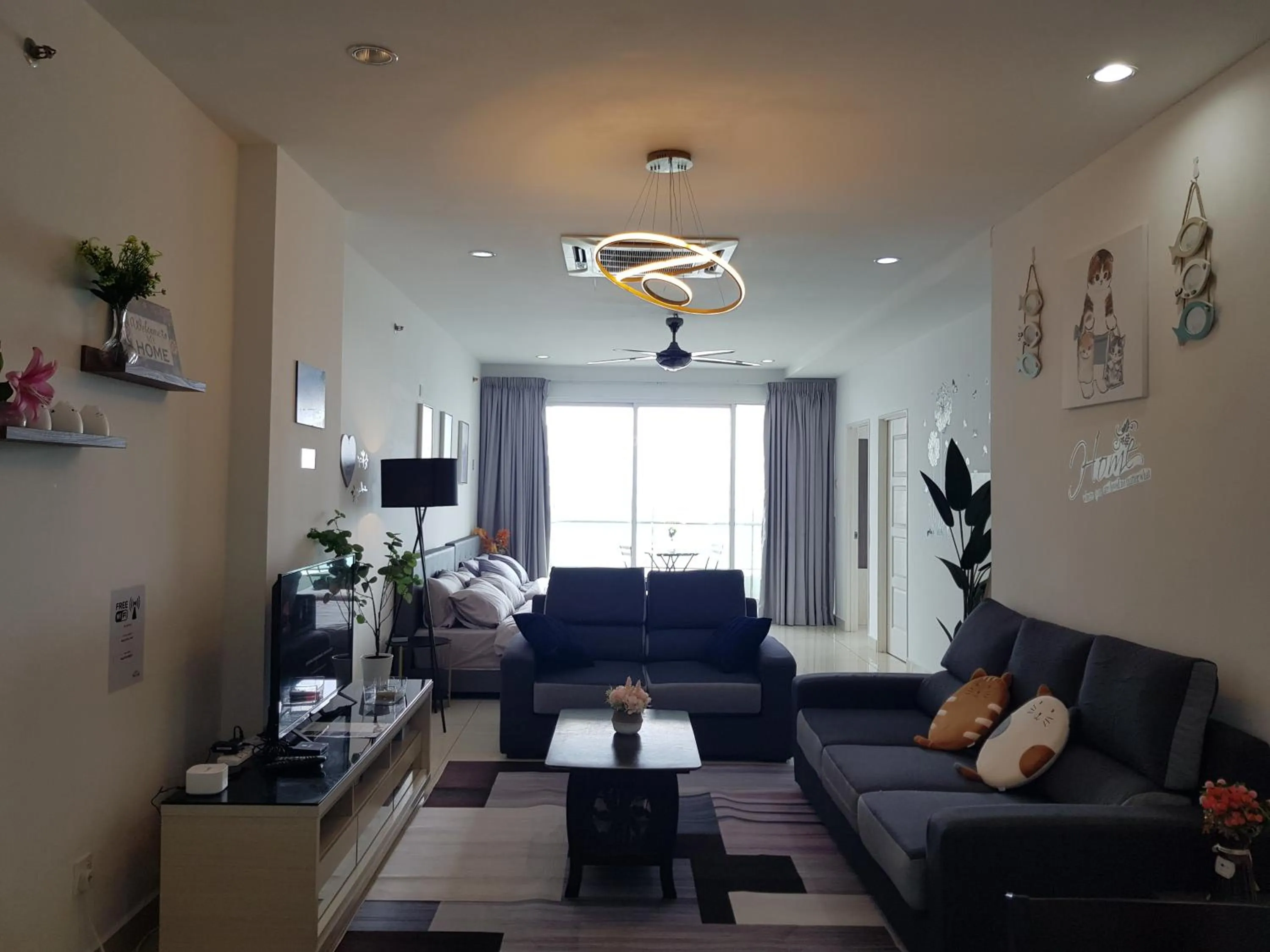 Living room in Mansion One Suite by stayCATion Homestay