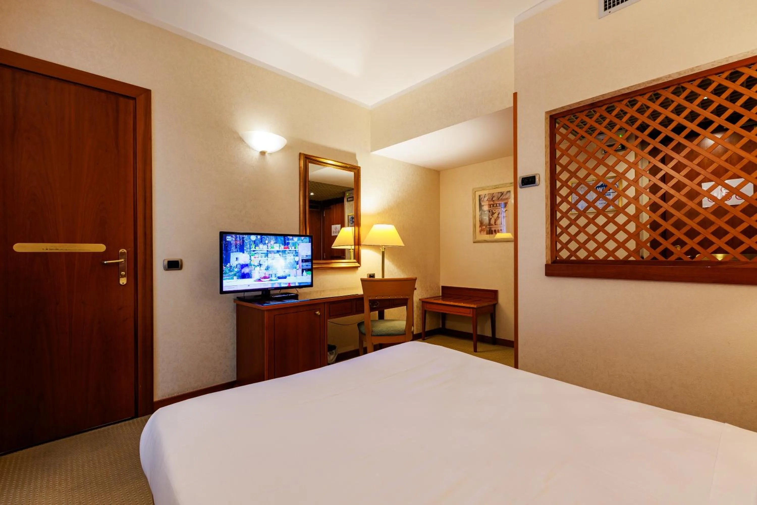 Bed in Hotel Excelsior Magenta