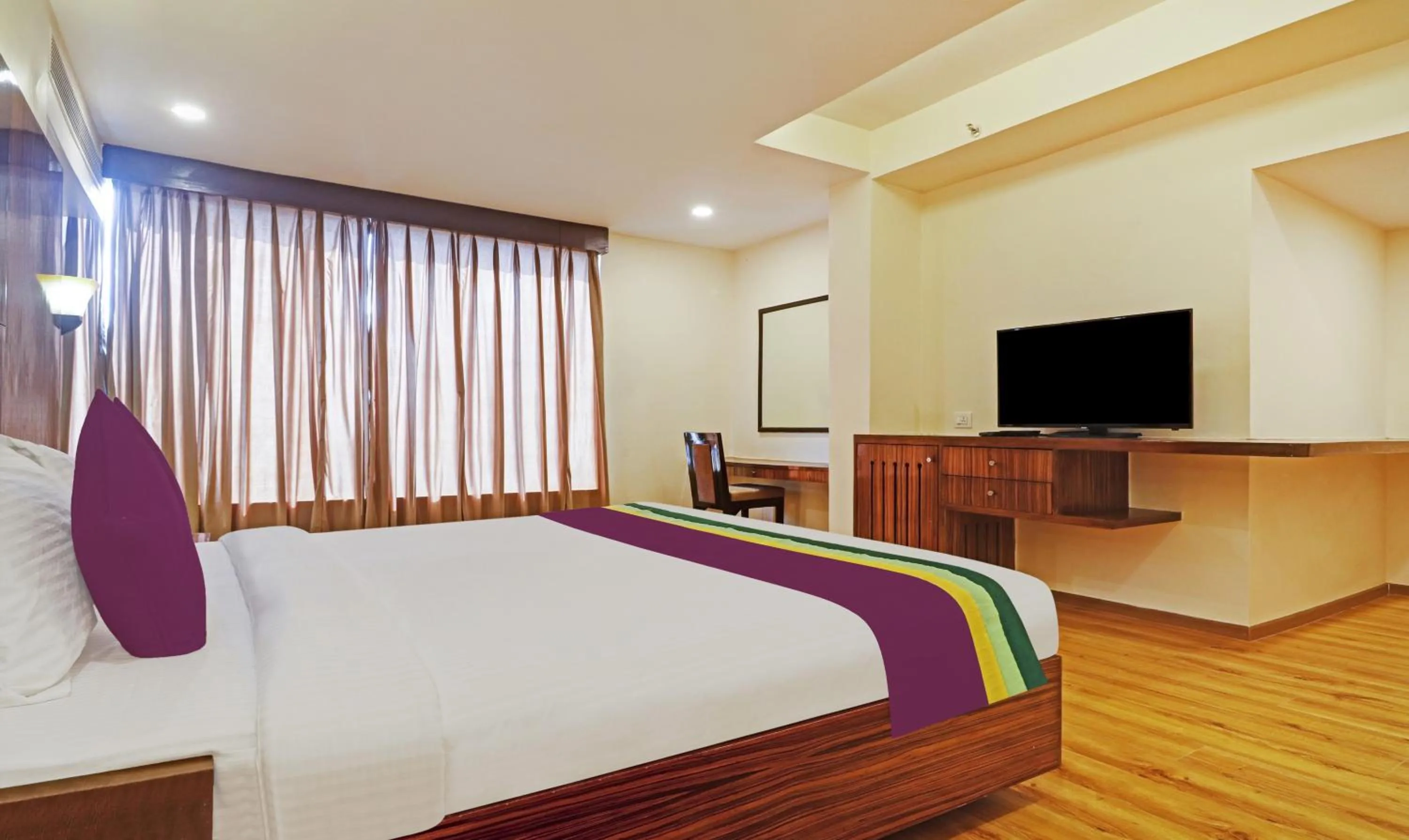 Bedroom, Bed in Treebo Premium Seven Lake View