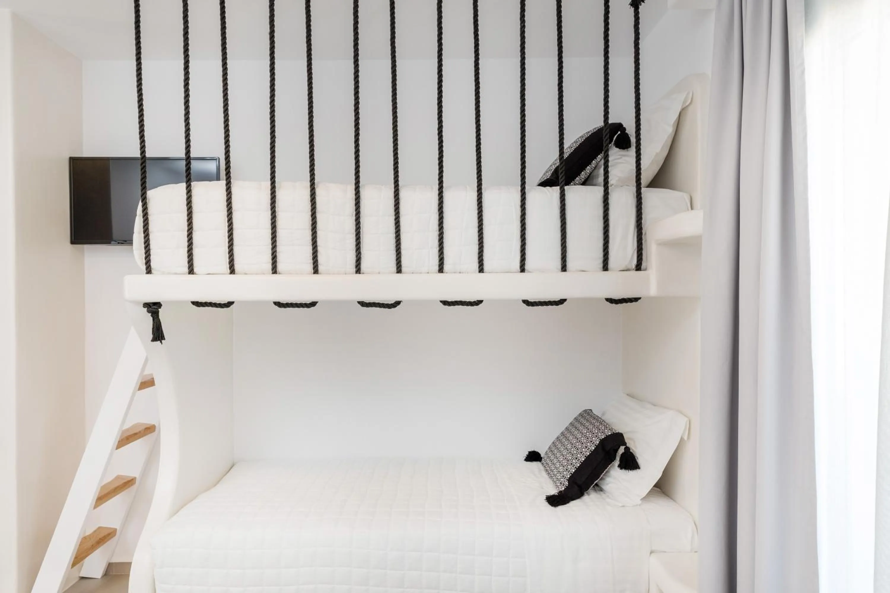 Bed in Alenor City Hotel