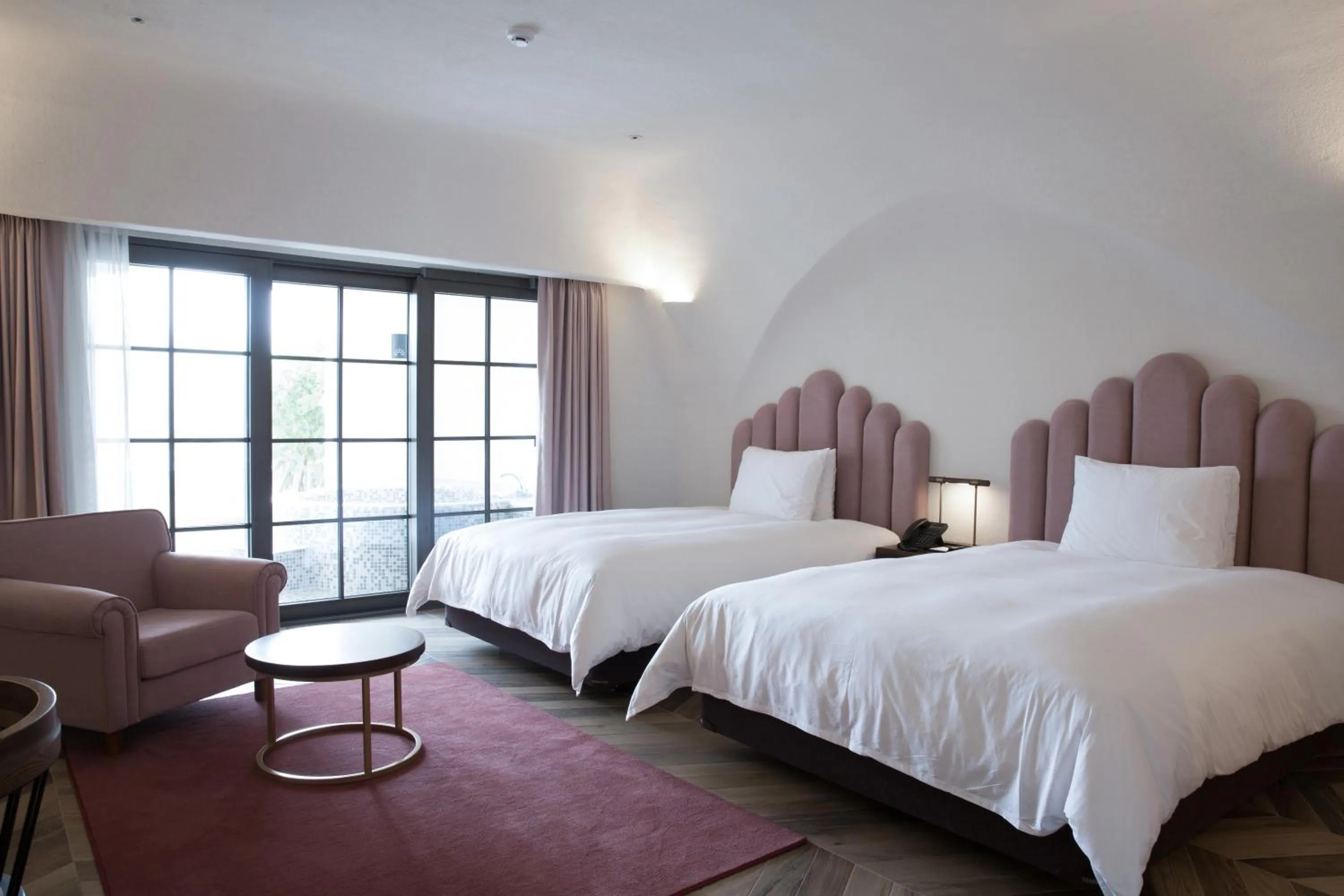 Bed in Ecoland Hotel