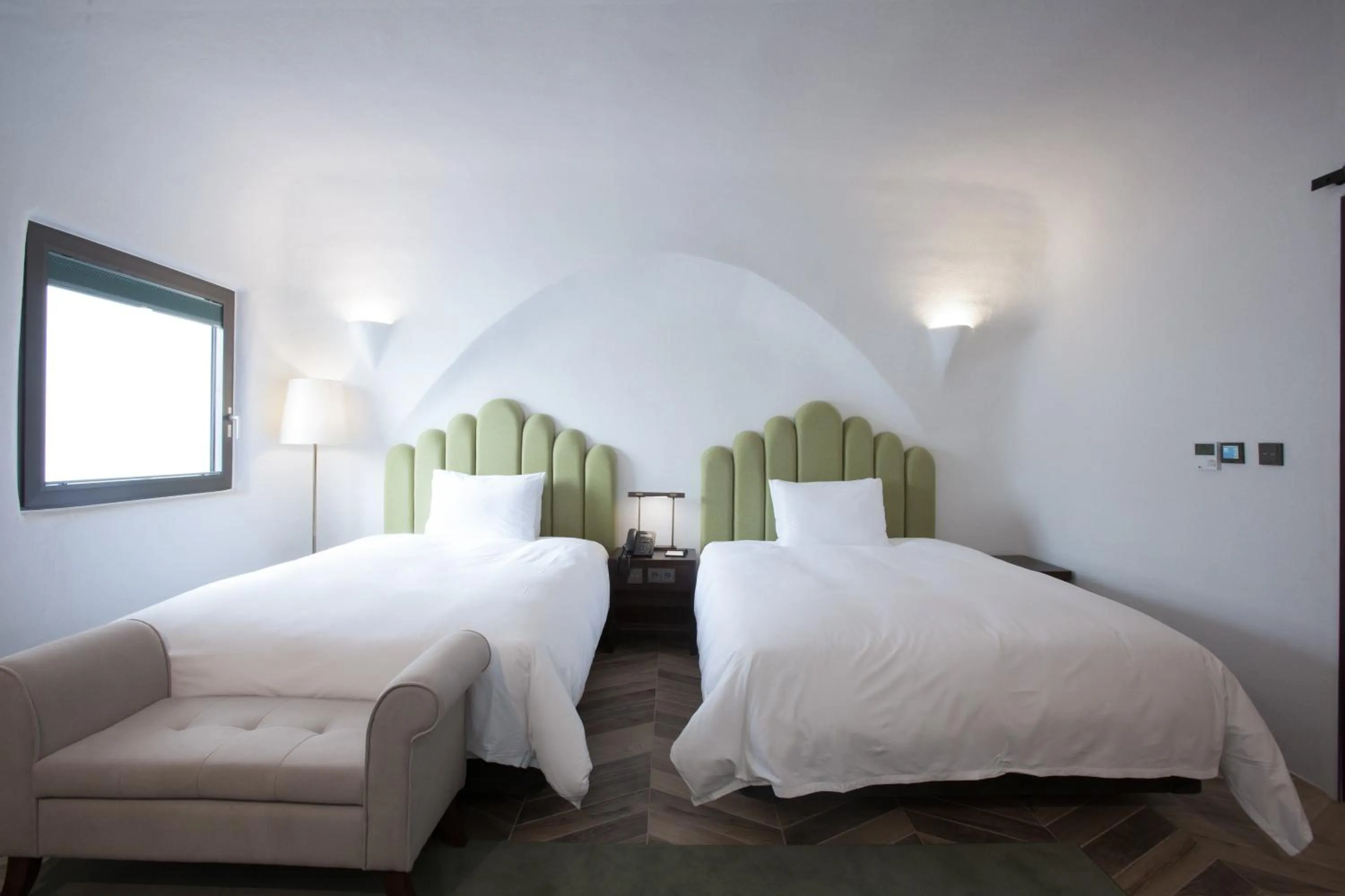 Bed in Ecoland Hotel