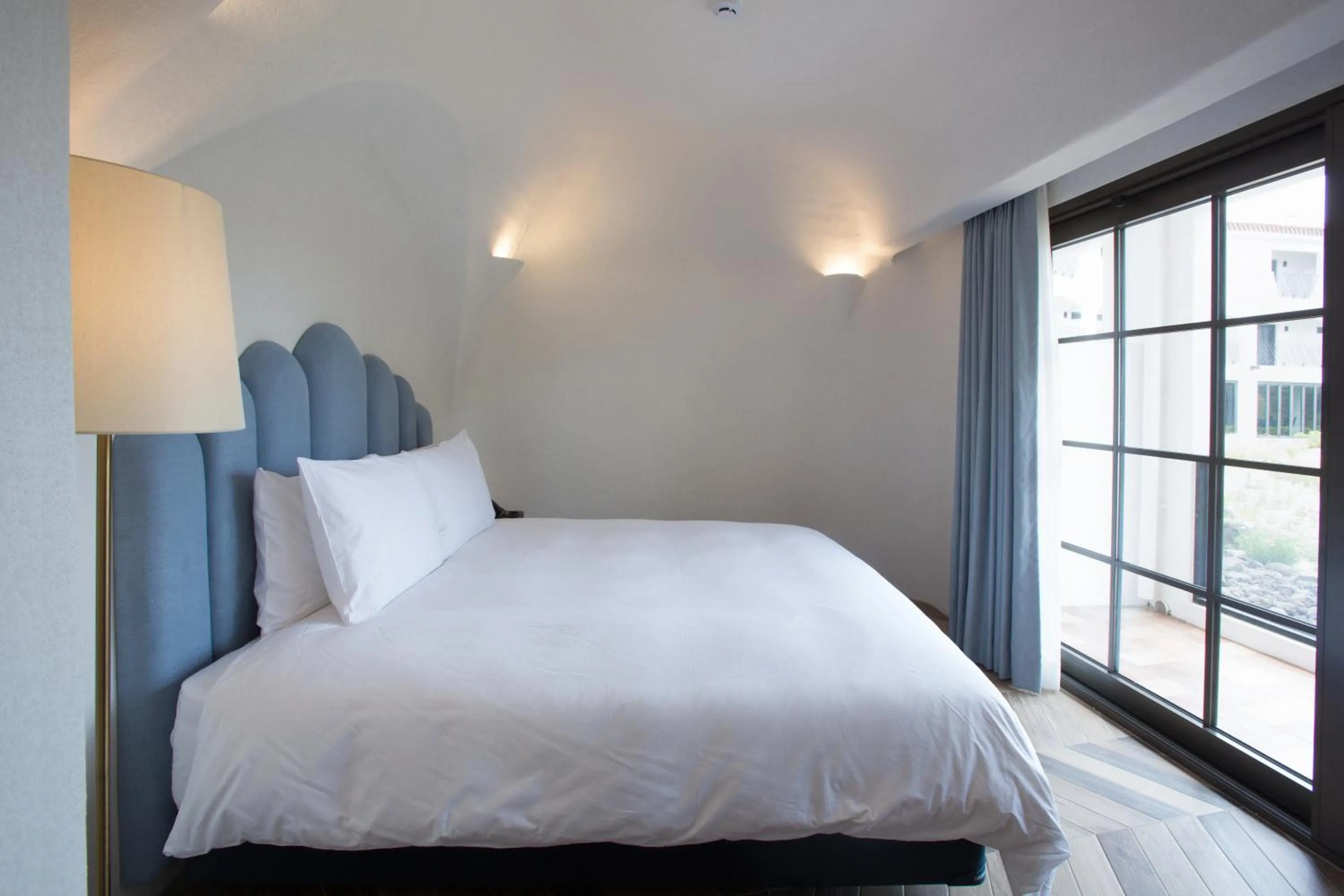 Bed in Ecoland Hotel